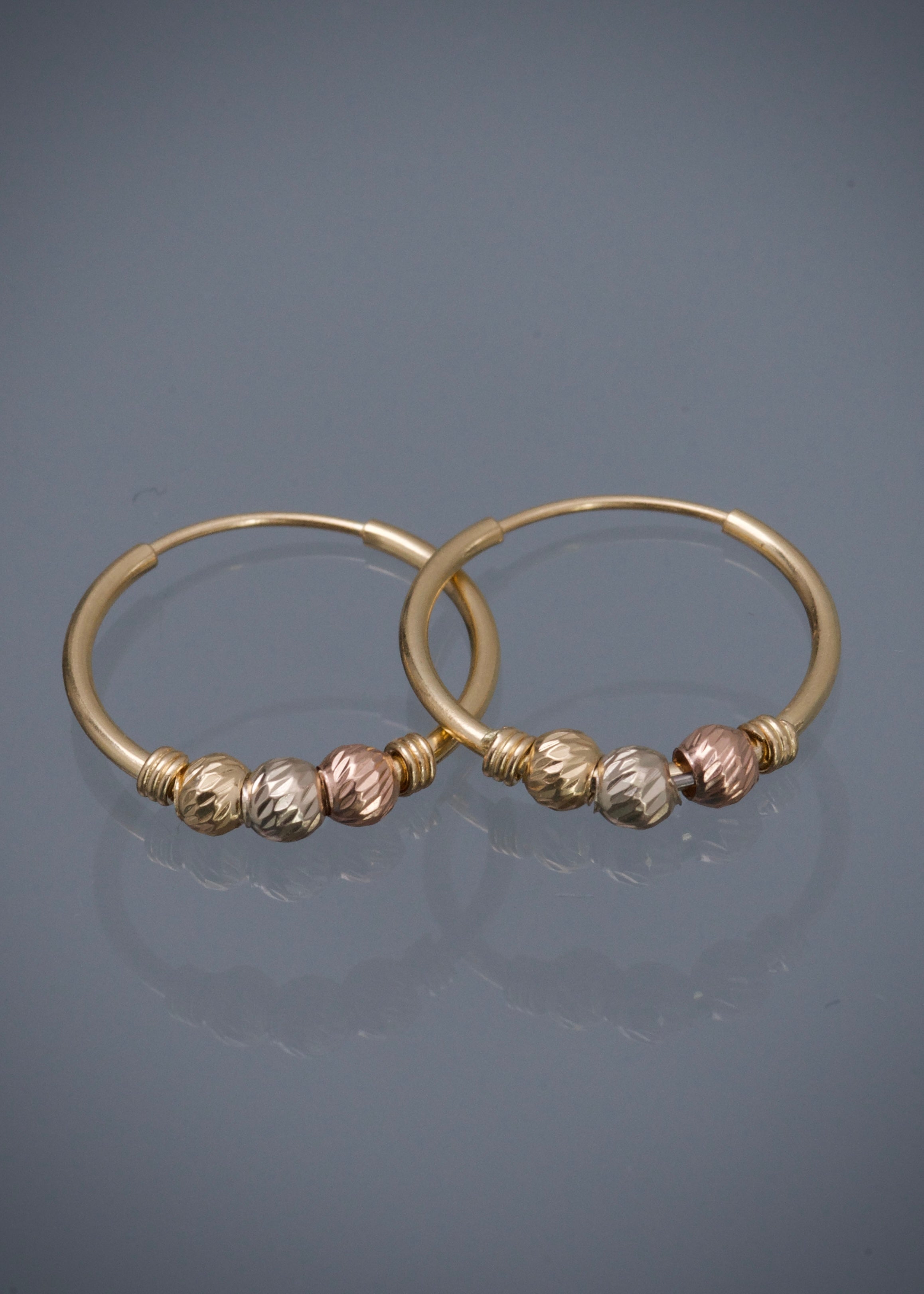 Candongas con bolas diamantadas 1.05gr / Largo 1.6cm / Tres Oros Nac B