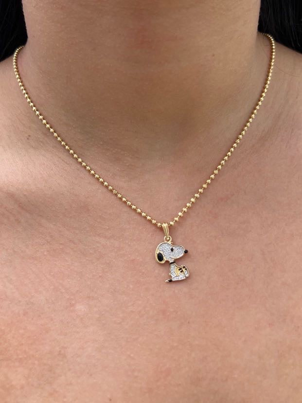 Dije snoopy con swarovski blanco 1.85gr / Largo 2.3cm / Oro Amarillo Nac P