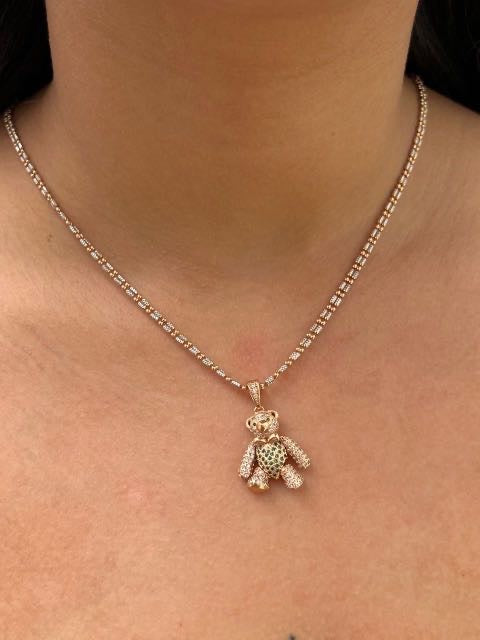 Dije articulado con swarovski verde y blanco 6.9gr / Largo 3cm / Oro Rosado Nac P