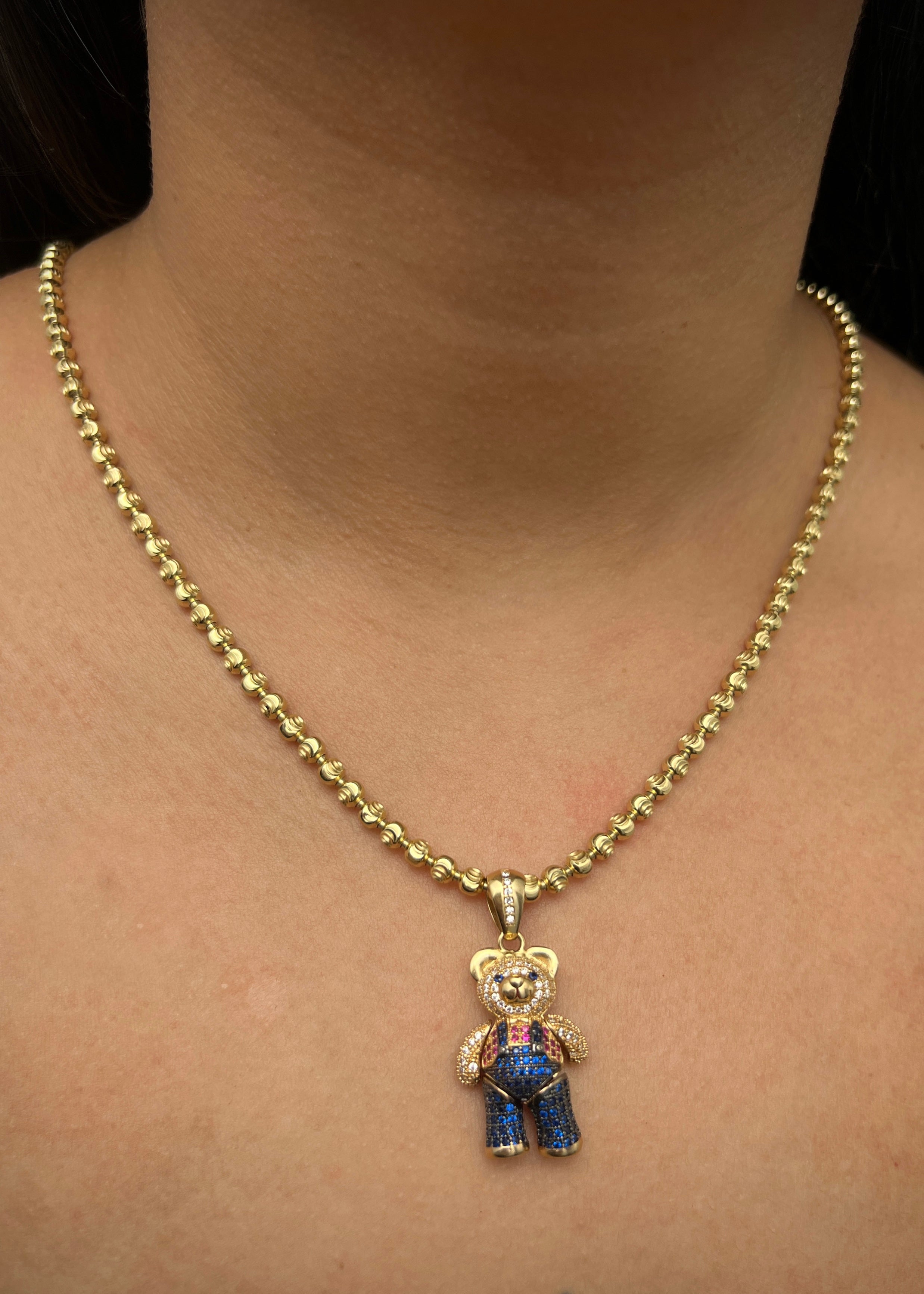 Dije oso articulado con swarovski 8.65gr / Largo 3.6cm / Oro Amarillo Nac M