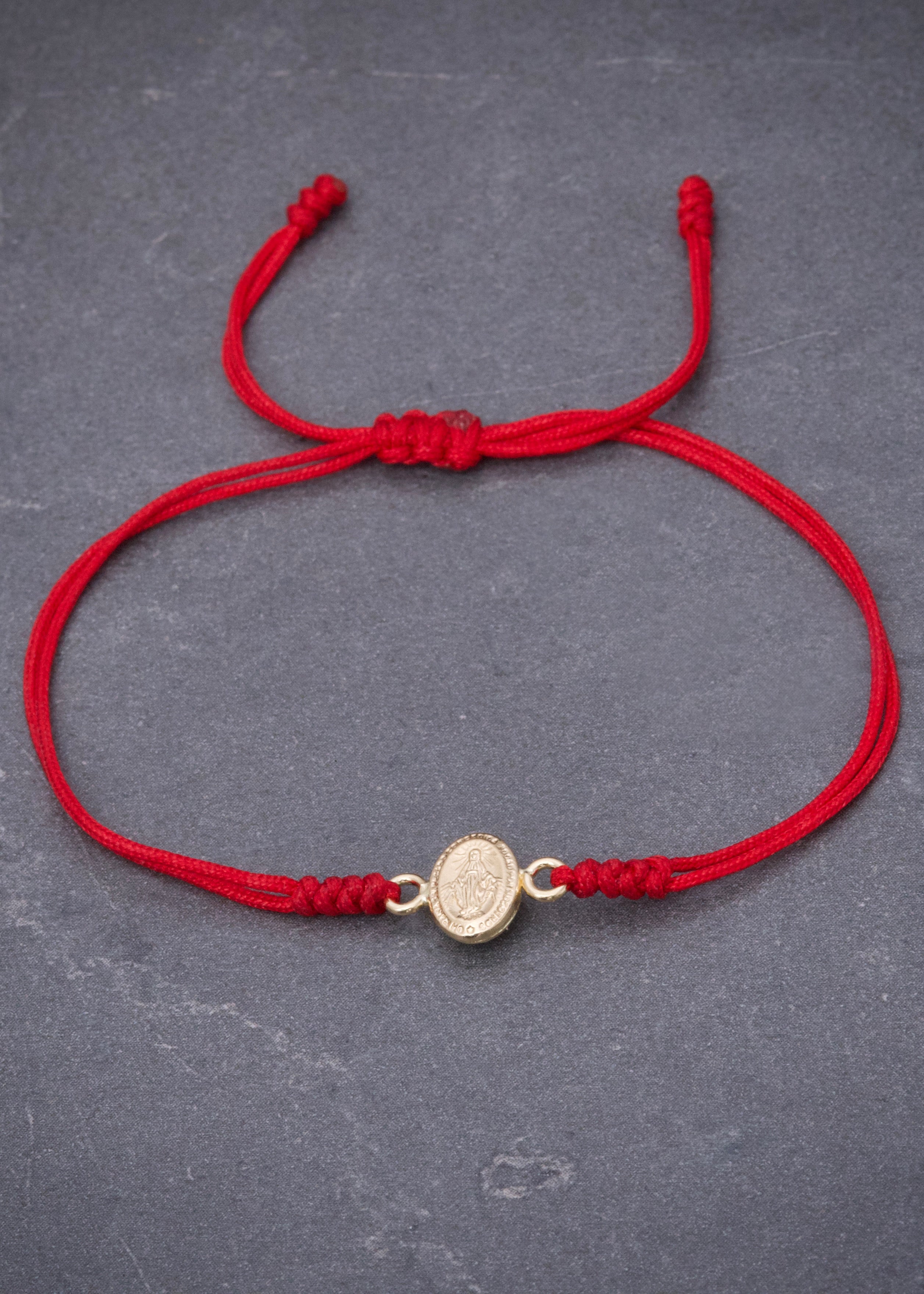 Pulsera en hilo rojo con herraje virgen de la milagrosa 0.35gr / Oro Amarillo (Joya) M