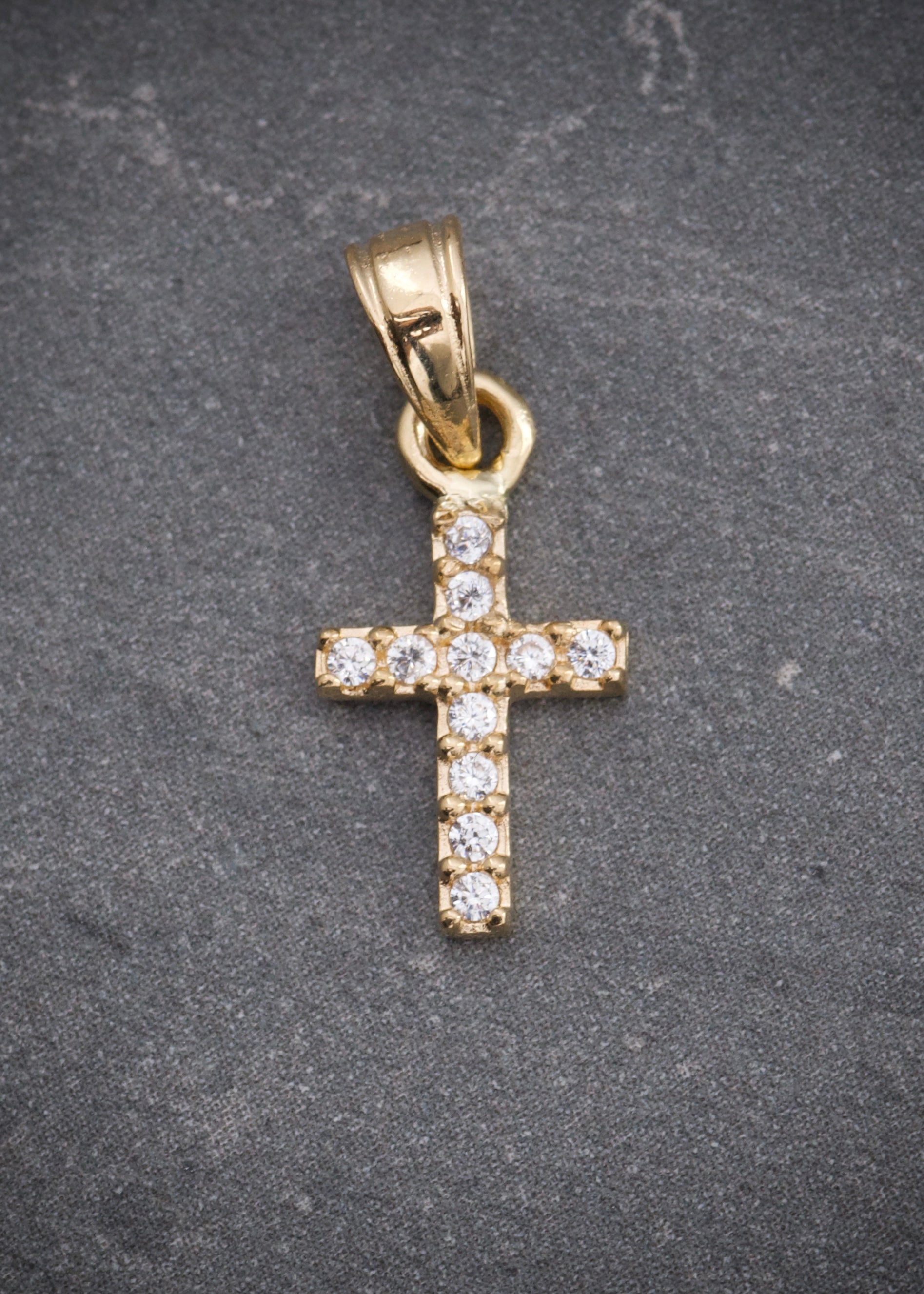 Dije cruz con swarovski blanco 0.8gr / Largo 1.4cm / Oro Amarillo Nac B