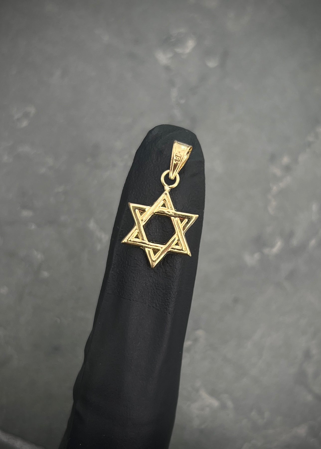 Dije estrella de david 0.55gr / Largo 2cm — Oro Amarillo