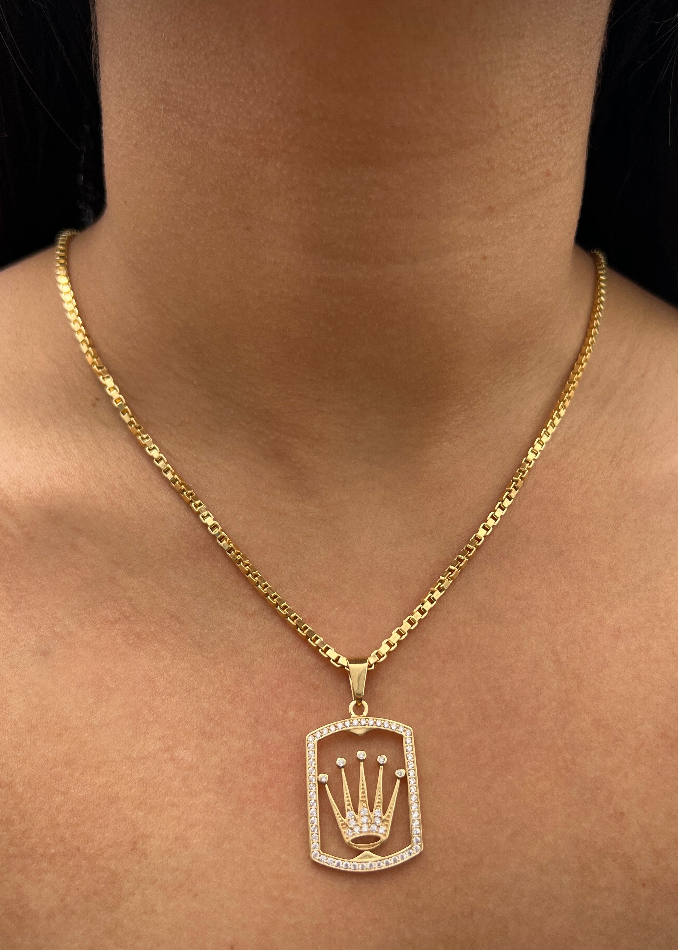 Dije rx con swarovski blanco 4.15gr / Largo 3.8cm / Oro Amarillo Nac M