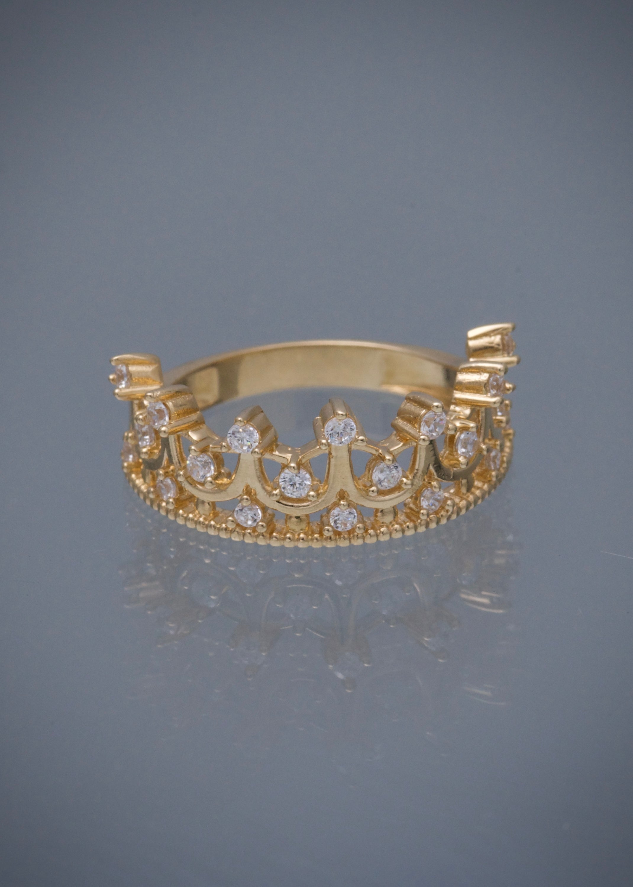 Anillo corona con swarovski blanco 4.25gr / Talla 7 1/4 / Oro Amarillo Nac P