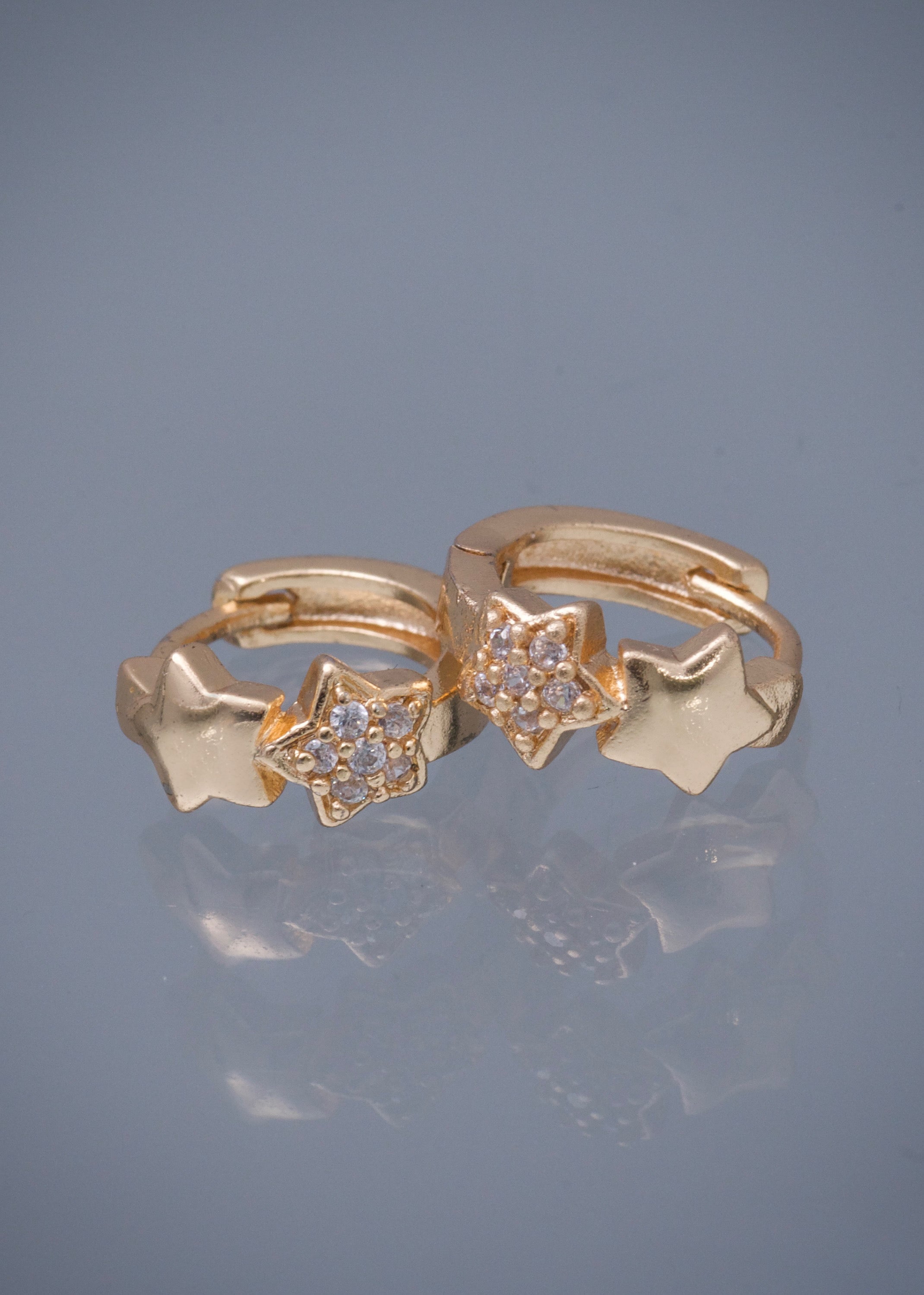 Candongas estrellas con swarovski blanco 2.5gr / Largo 1.2cm / Oro Amarillo Nac B