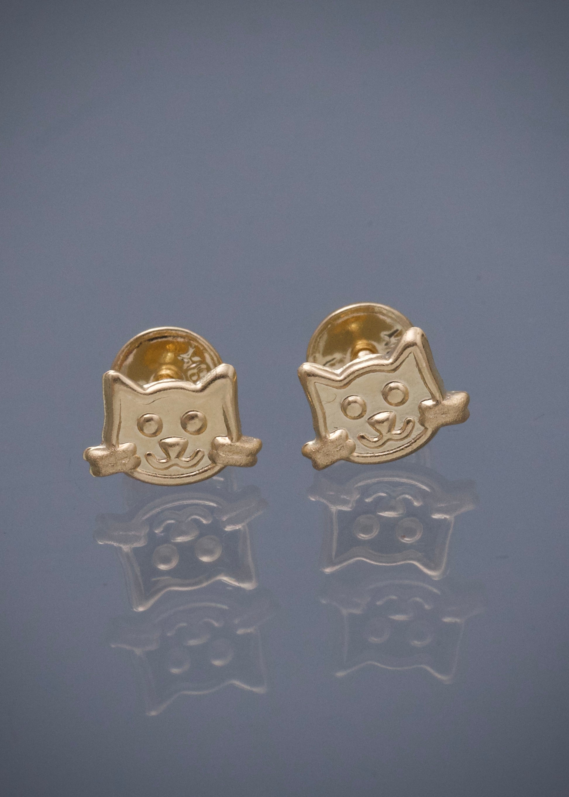 Topos de gato 0.65gr / Largo 0.5cm — Oro Amarillo