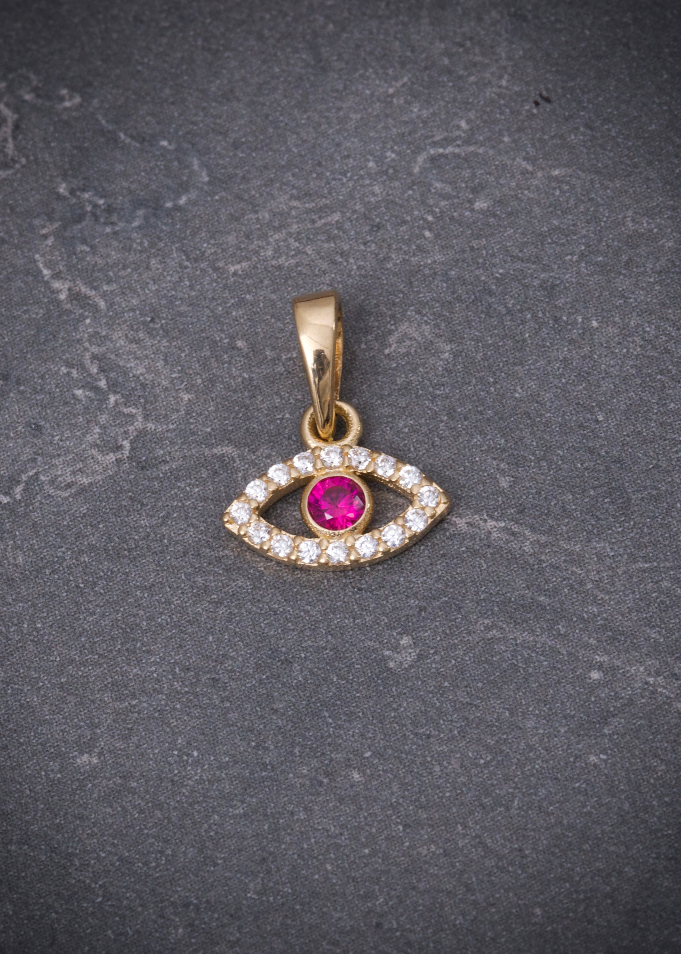 Dije ojo turco con swarovski fucsia y blanco 0.55gr / Largo 1.2cm / Oro Amarillo Nac M
