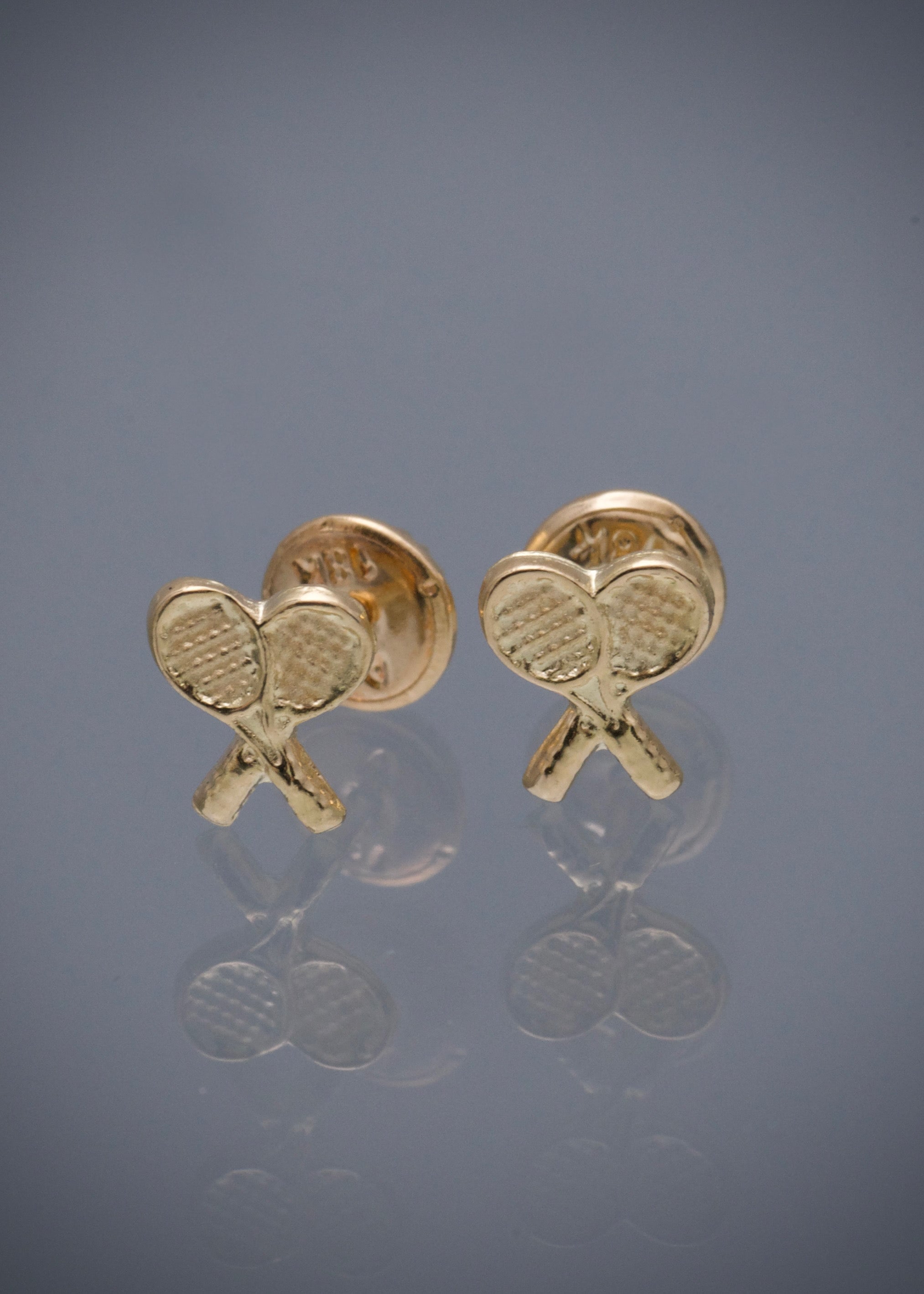 Topos de raqueta 0.6gr / Largo 0.3cm / Oro Amarillo Nac M