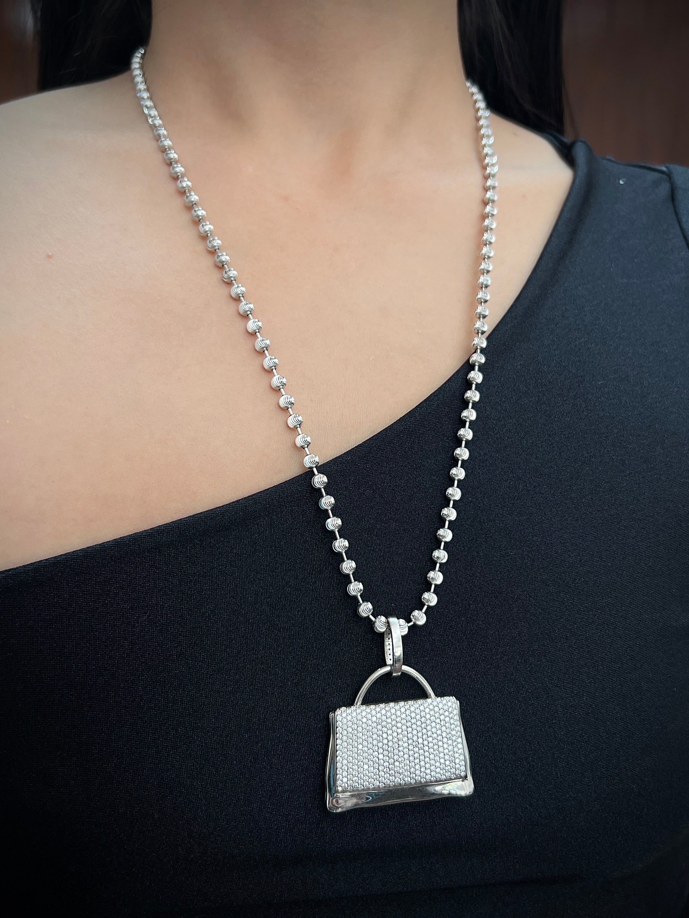 Dije de bolso con MOS 330pts (0.35QTS) 37.6gr / 4.5cm / Oro Blanco Nac (Joya) B