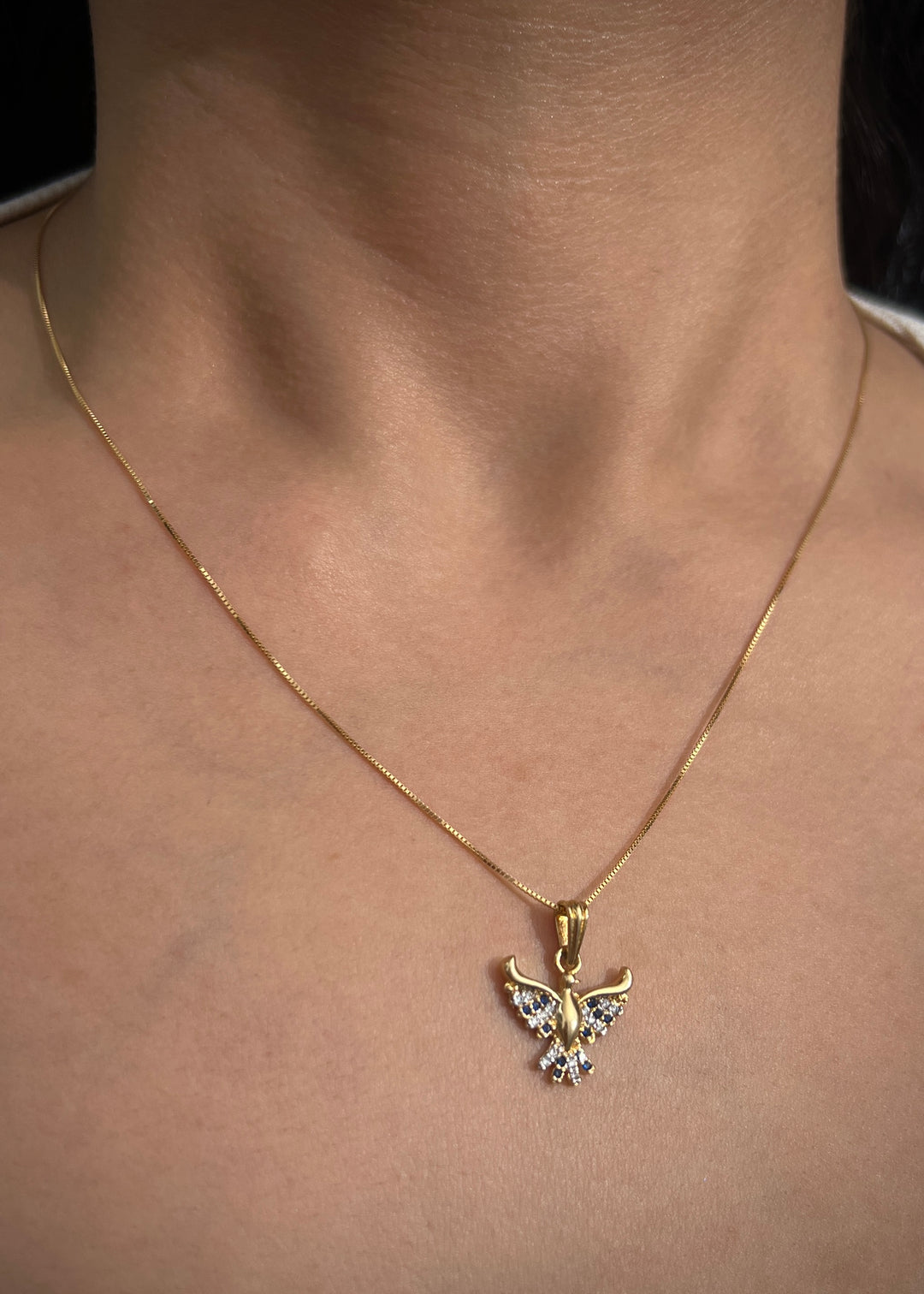 Dije ave fenix con swarovski azul y blanco 1.7gr / Largo 2cm — Oro Amarillo