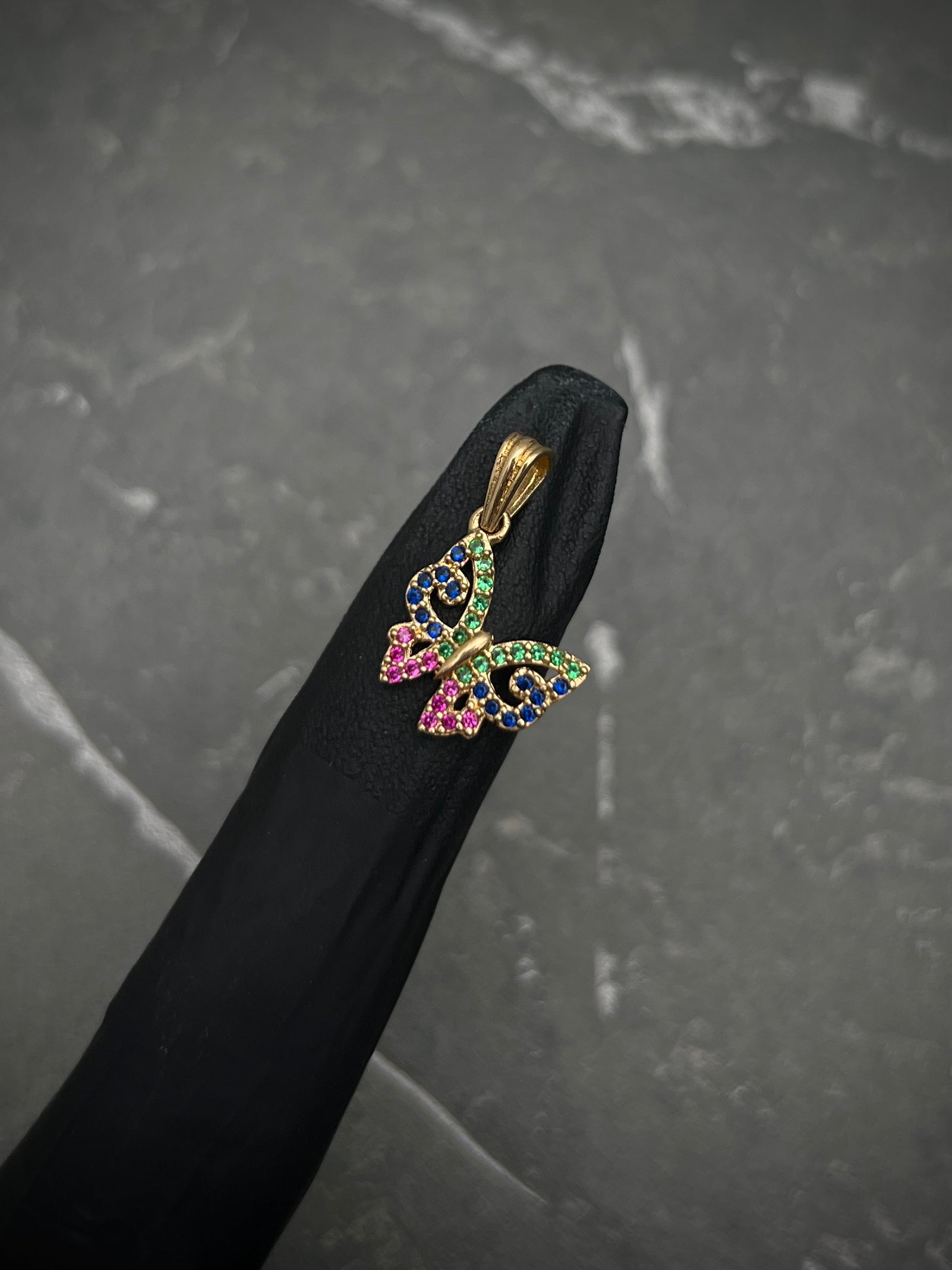 Dije de mariposa con swarovski multicolor 1.35gr / 2cm / Oro Amarillo Nac M