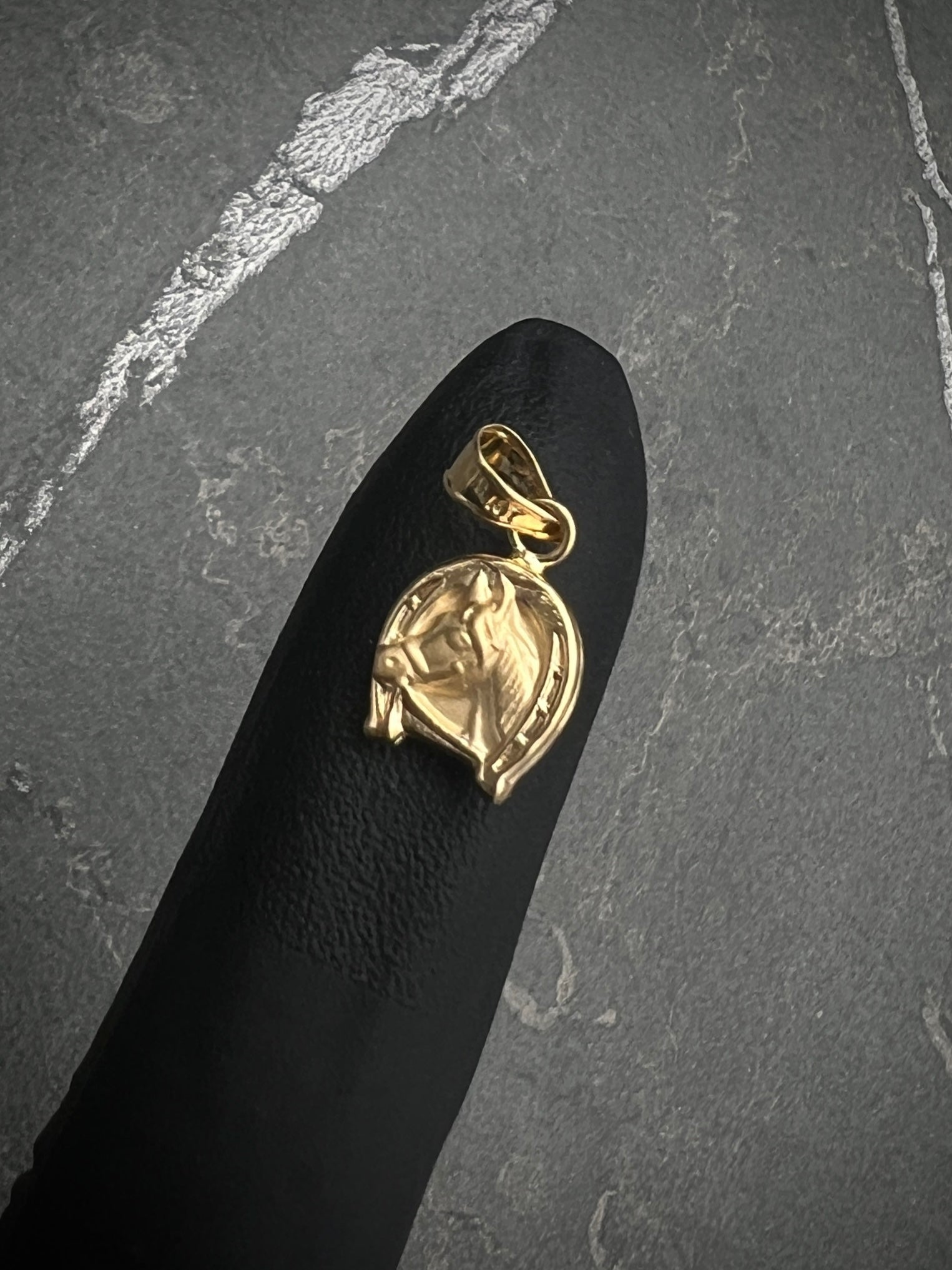 Dije herradura de caballo 0.5gr / 1.5cm / Oro Amarillo Nac P