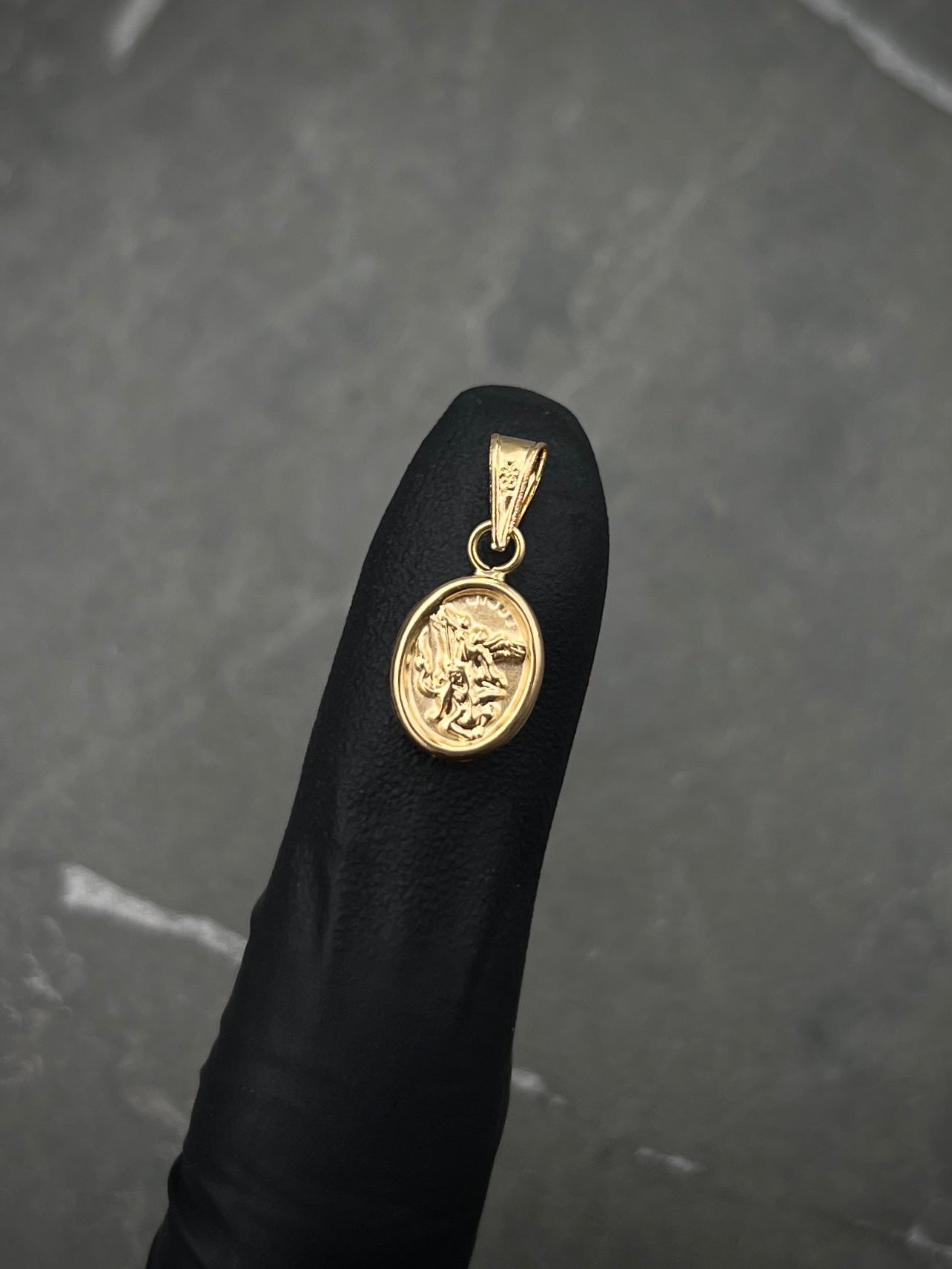 Dije arcangel san miguel 0.45gr / Largo 1.7cm / Oro Amarillo Nac M