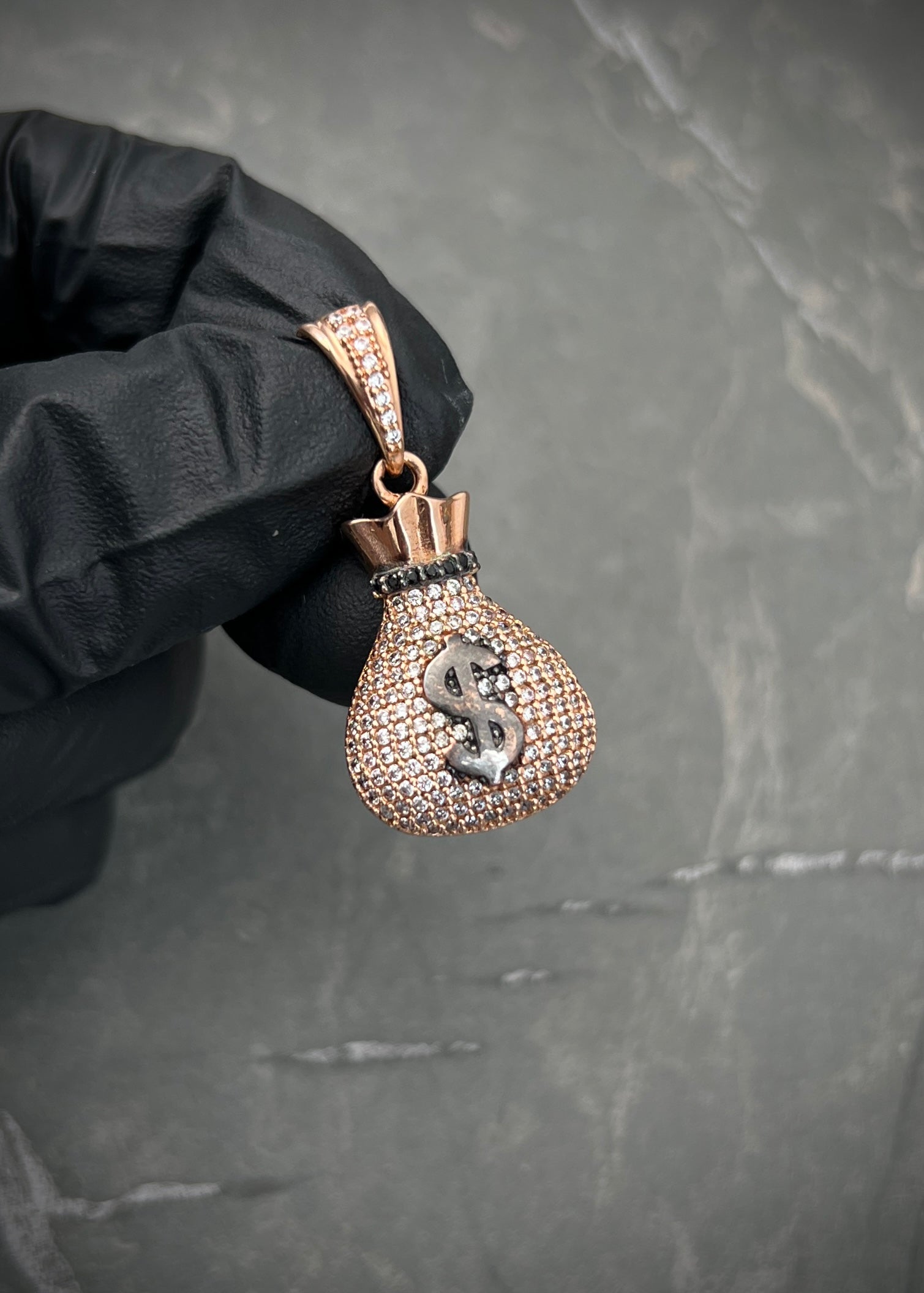 Dije bolsa de dinero con swarovski blanco 6.45gr / Largo 3.5cm / Oro Rosado Nac B