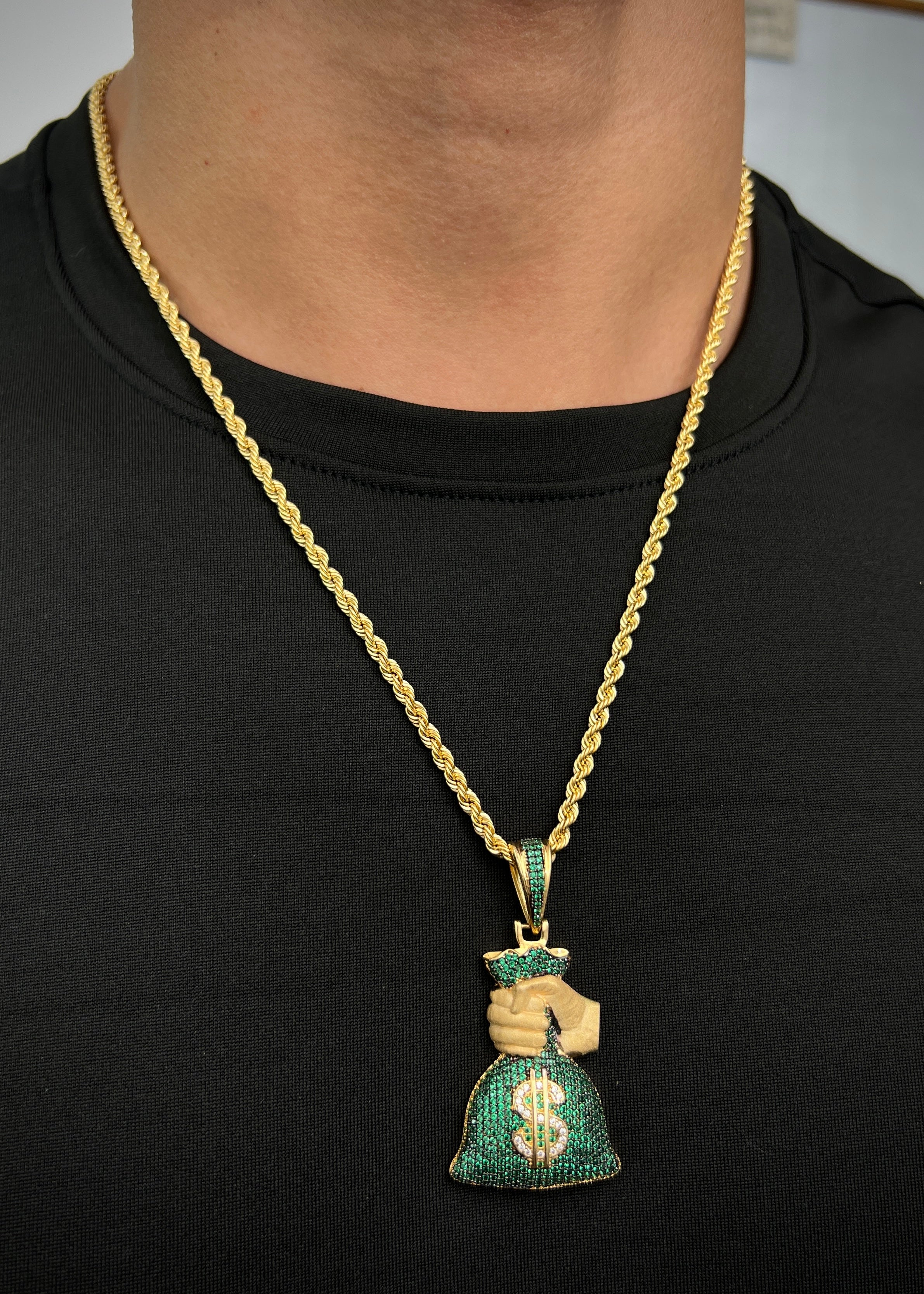 Dije bolsa de dinero con swarovski verde 15.75gr / Largo 5.5cm / Oro Amarillo Nac M