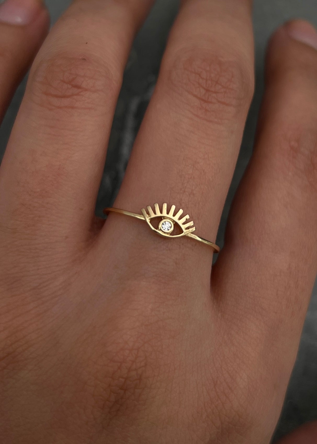 Anillo ojo con swarovski blanco 0.7gr / TALLA 7 1/2 / Oro Amarillo Nac P