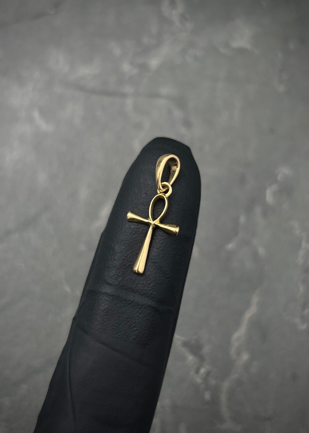 Dije cruz egipcia 0.6gr / Largo 2cm / Oro Amarillo Nac M