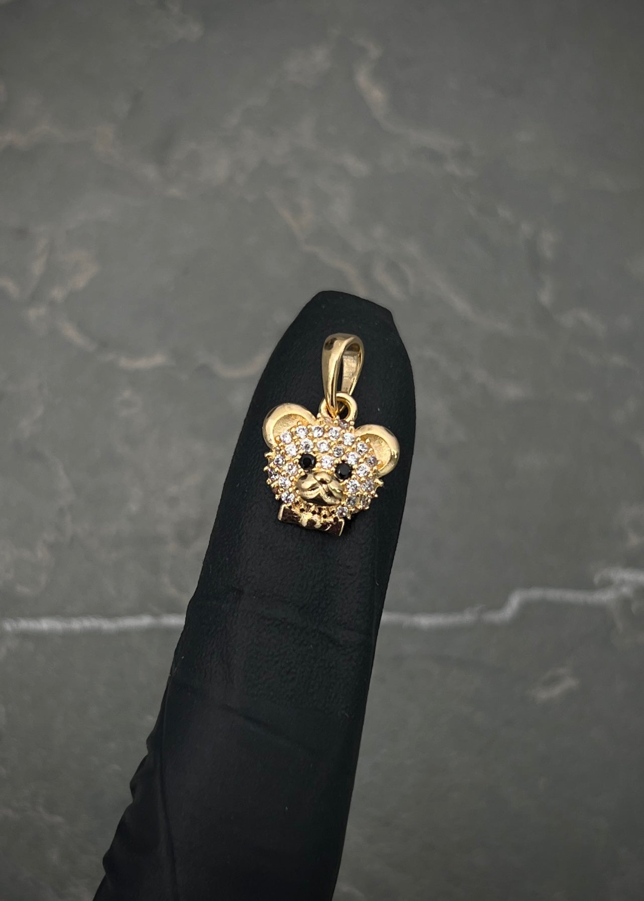 Dije oso con swarovski blanco y negro 1.35gr / Largo 1.5cm / Oro Amarillo Nac P