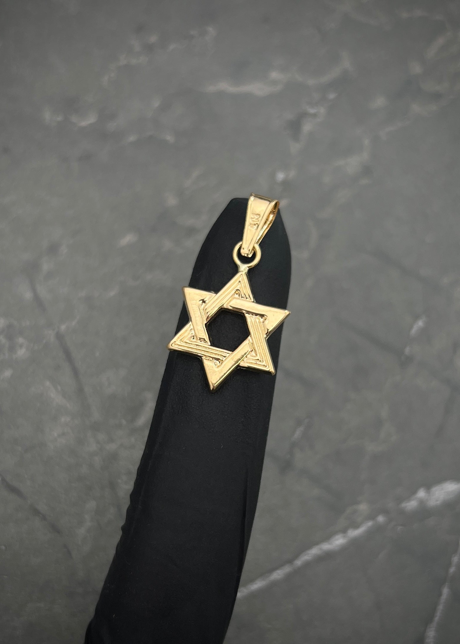 Dije Estrella de david 1.05gr / Largo 2.7cm / Oro Amarillo Nac M