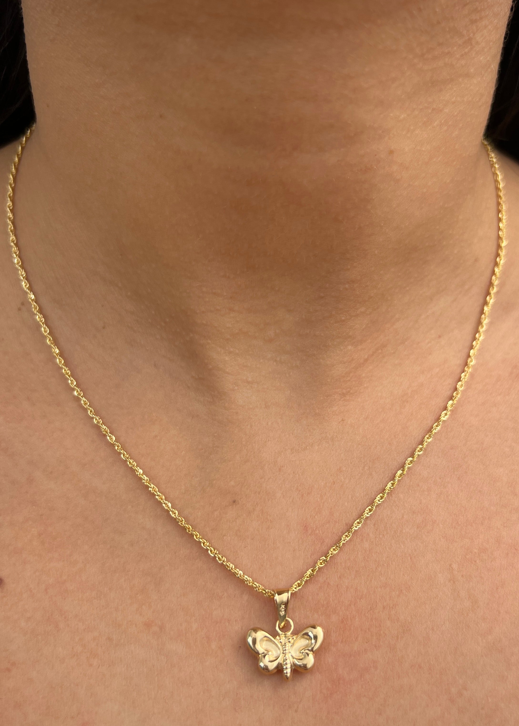 Dije mariposa 0.8gr / Largo 1.7cm / Oro Amarillo Nac B