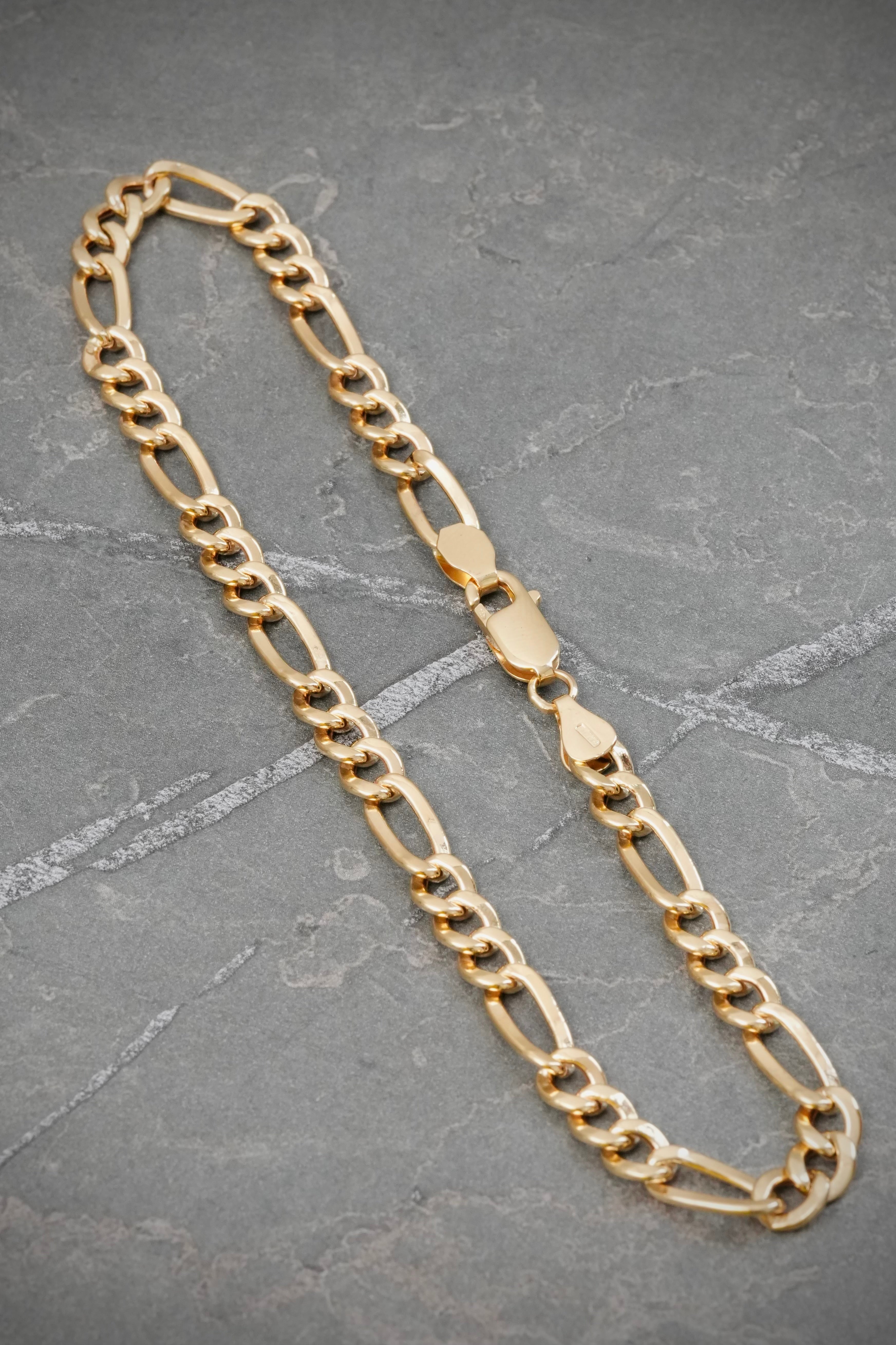 Tobillera Figaro 8.4gr / 29.5cm / 5.7mm — Oro Amarillo