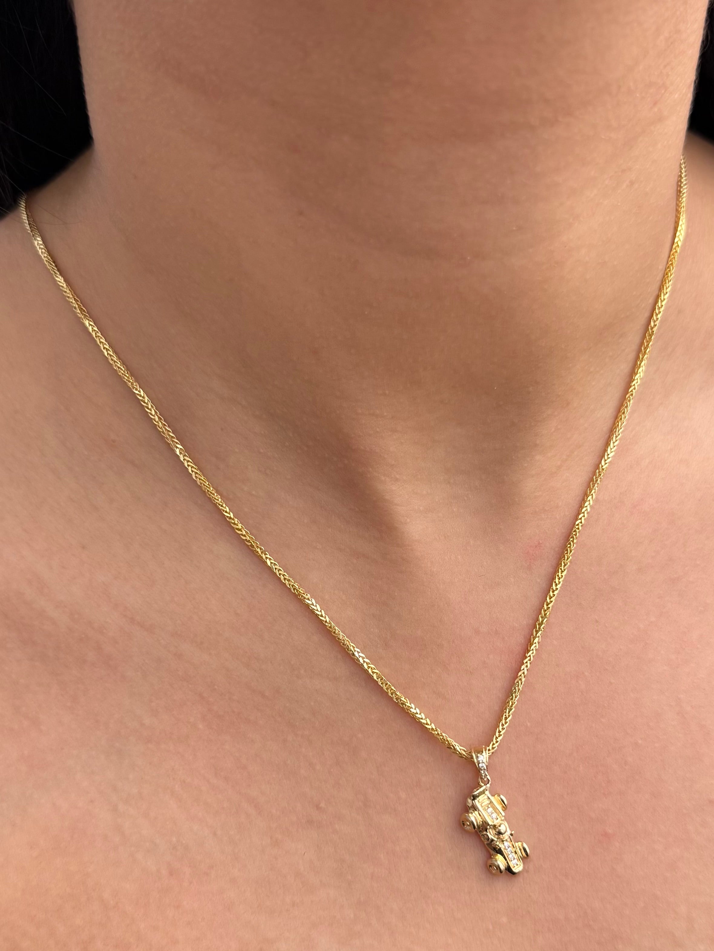 Dije Carro F1 1.55gr / 2.3cm / 8mm — Oro Amarillo