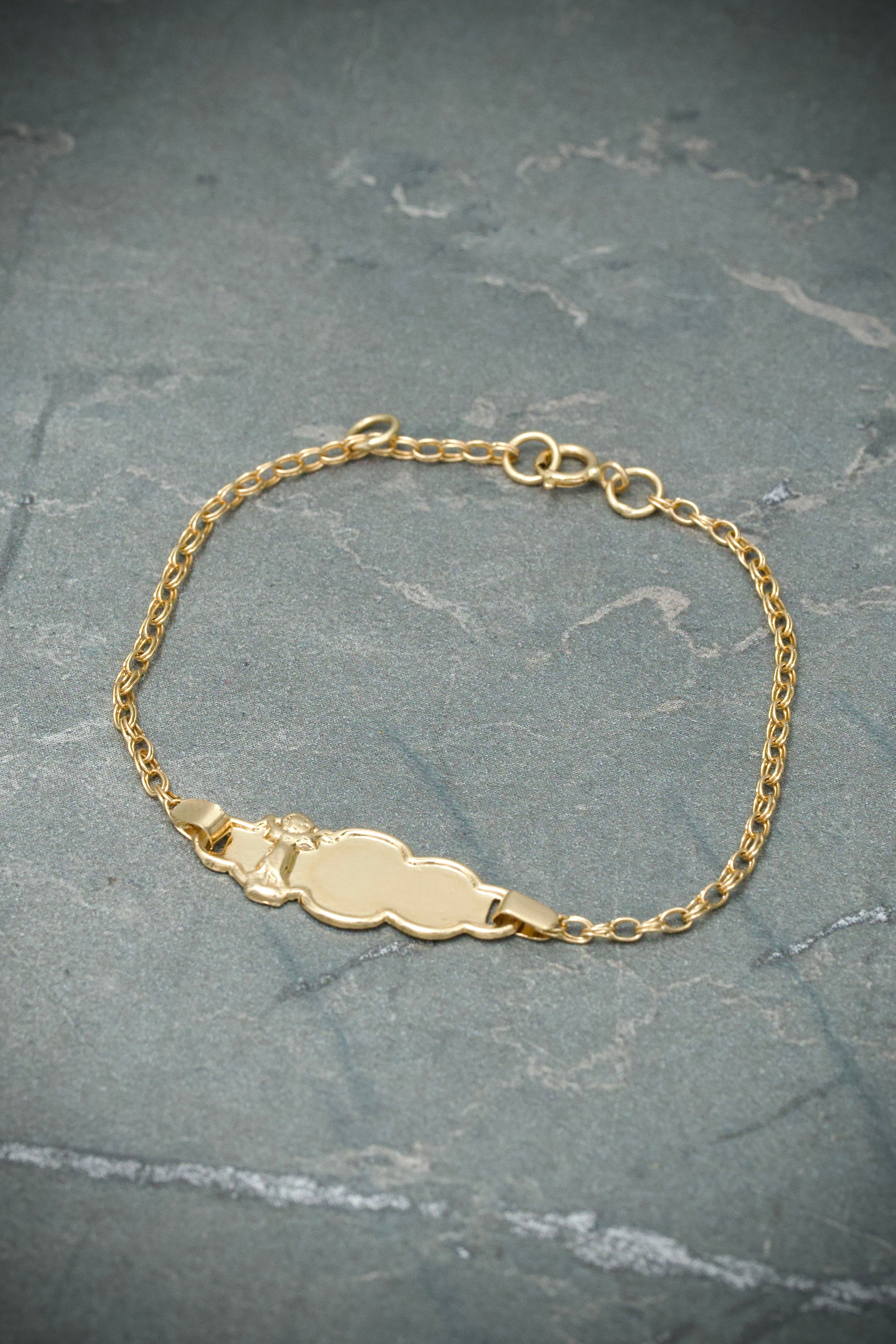 Pulso bebe con placa divino niño 1.25gr / Largo 15cm / Oro Amarillo Nac B