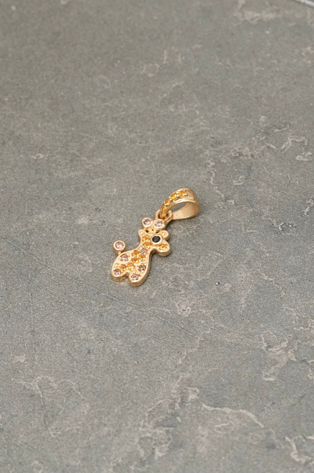 Dije jirafa con swarovski amarillo 1gr / Largo 1.9cm / Oro Amarillo Nac B