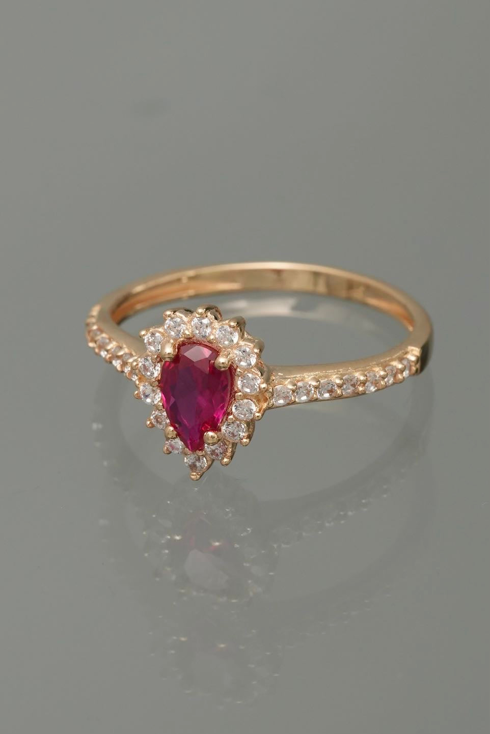 Solitario gota con swarovski fucsia y blanco 2.4gr / TALLA 6 1/2 / Oro Amarillo Nac P