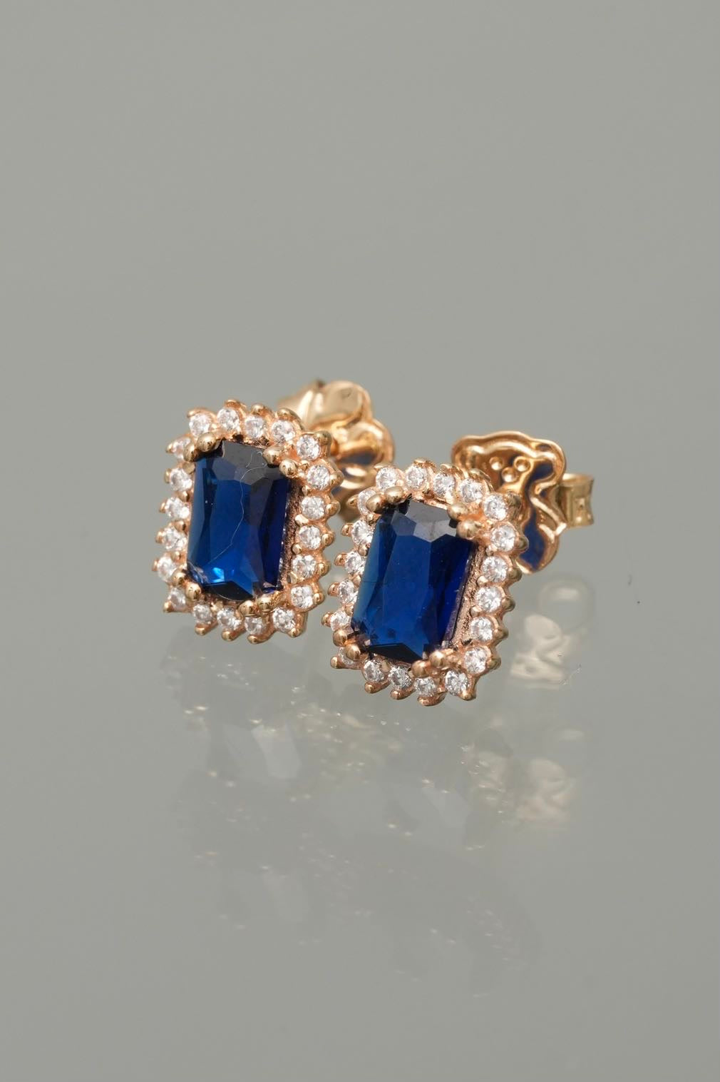 Topos con Swarovski azul y blanco 2.05gr / Largo 0.9cm — Oro Amarillo