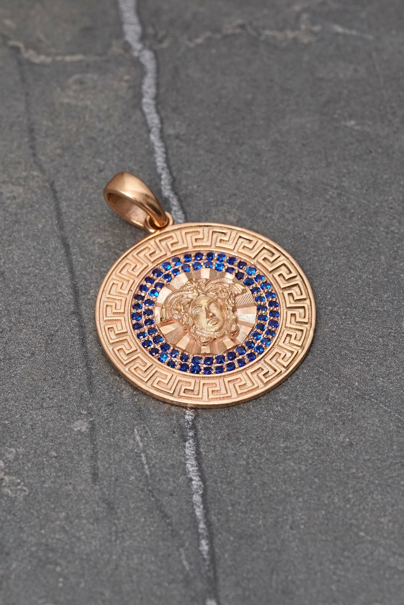 Dije medusa con swarovski azul 5.75gr / Largo 3.1cm — Oro Rosado