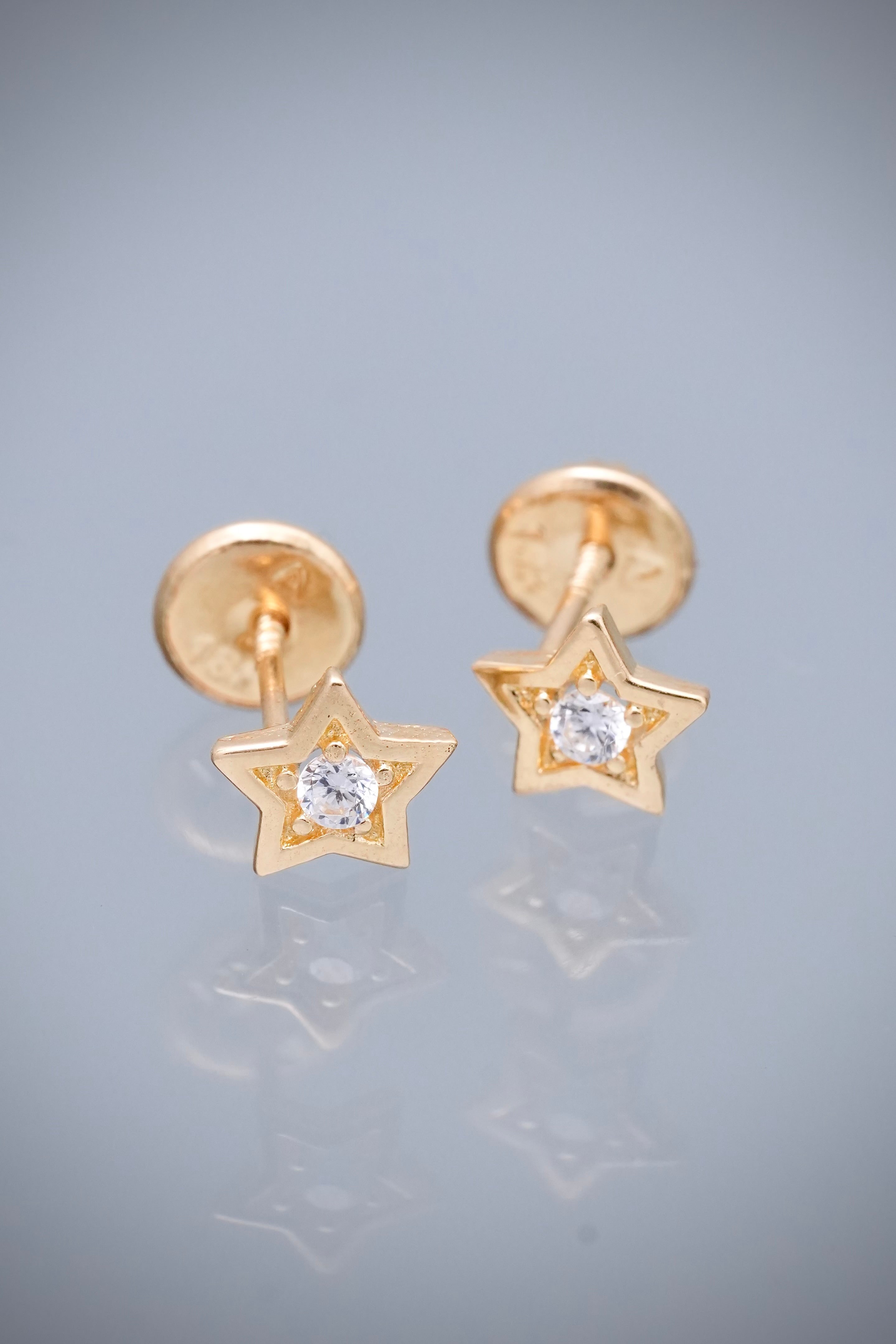 Topos estrella con swarovski blanco 0.75gr / Largo 0.6cm — Oro Amarillo