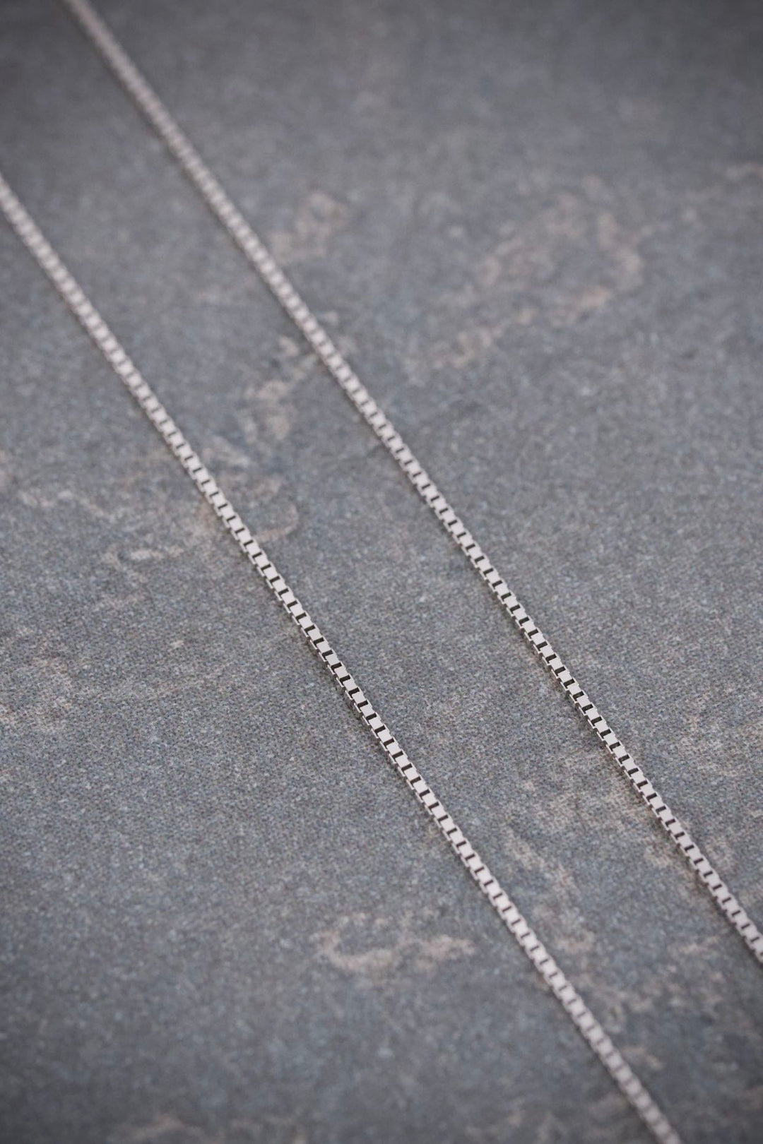 Cadena Veneciana 1gr / 50cm / 0.6mm — Oro Blanco
