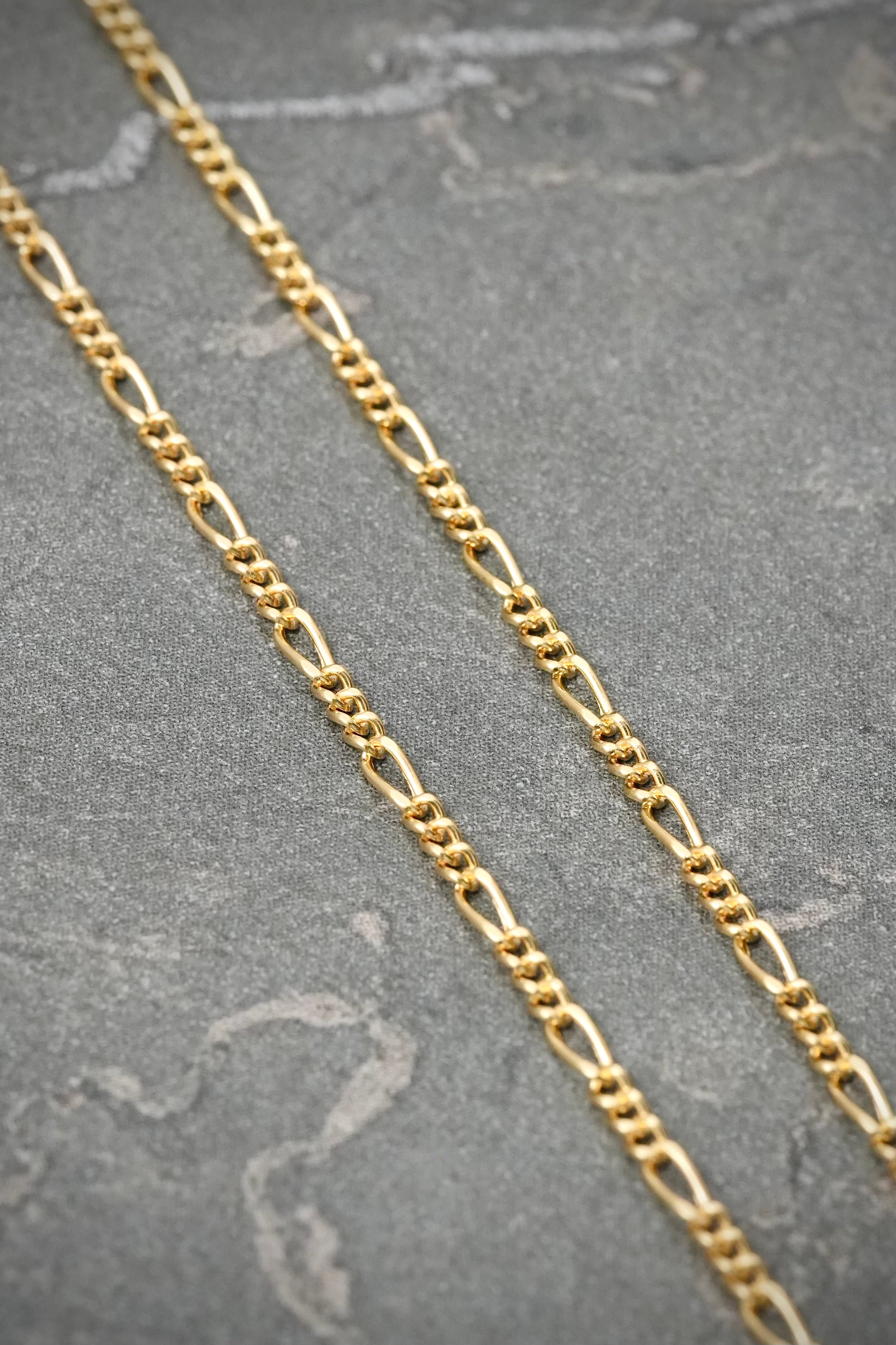 Cadena Figaro 1.6gr / 55cm / 1.5mm — Oro Amarillo