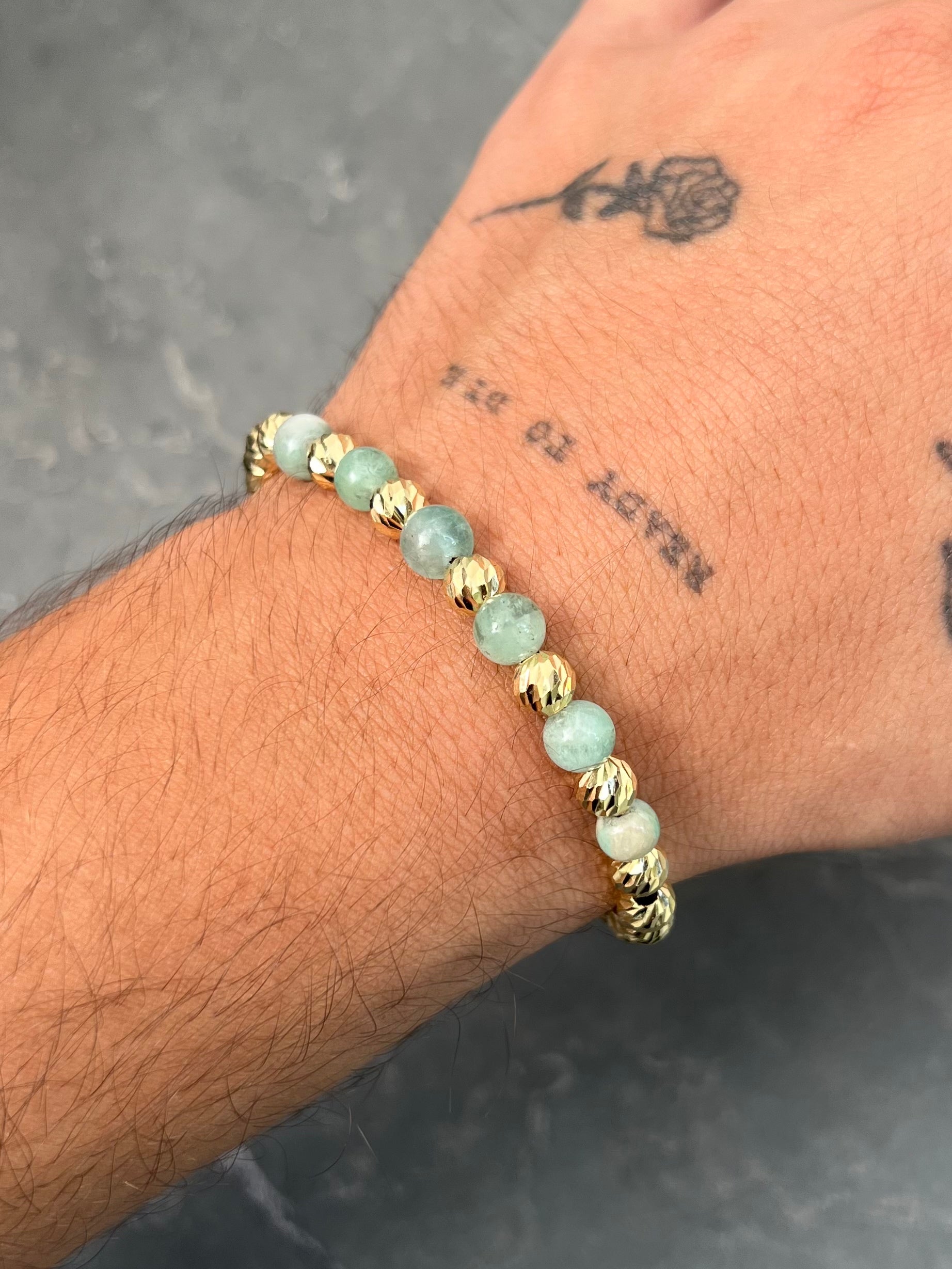 Pulsera en hilo negro con bolas diamantadas y morrallas 4.45gr / Oro Amarillo (Joya) M