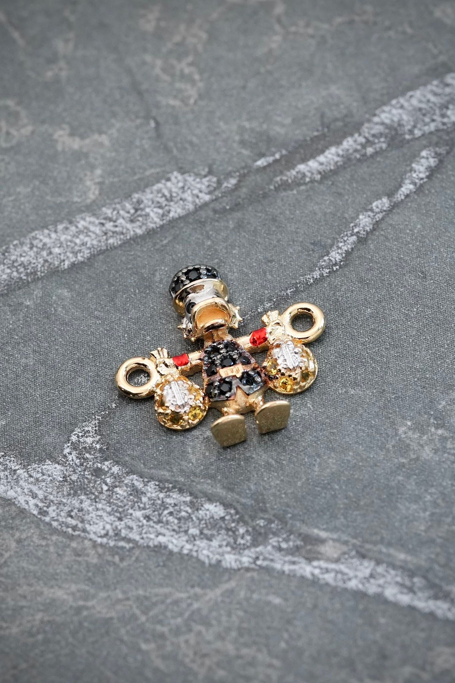 Herraje tio rico con swarovski negro y amarillo 1.45gr / Largo 1.5cm / Oro Amarillo Nac B