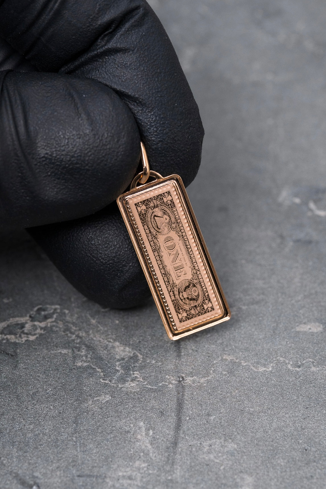 Dije dolar 1.05gr / Largo 2.9cm / Oro Rosado italy +4 M