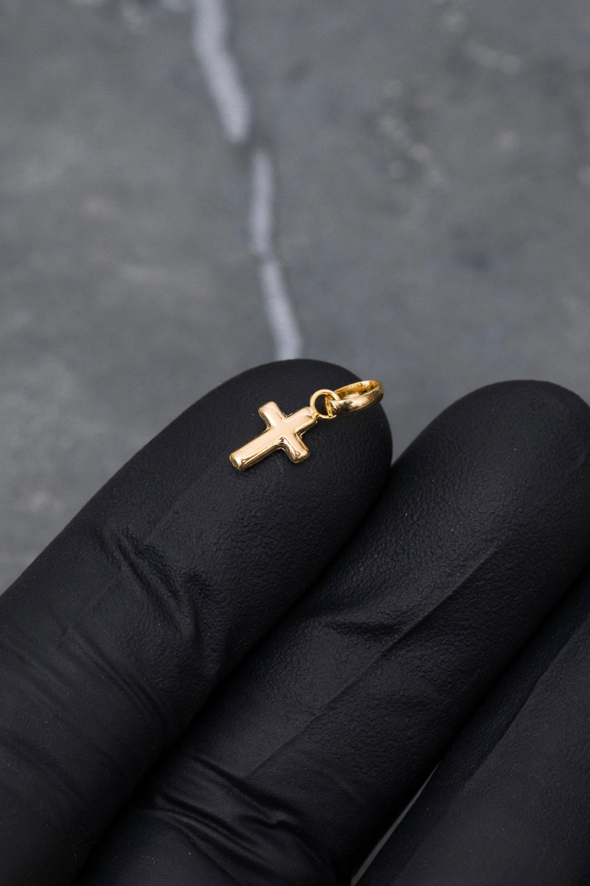 Dije cruz 0.2gr / Largo 1.4cm / Oro Amarillo Nac P