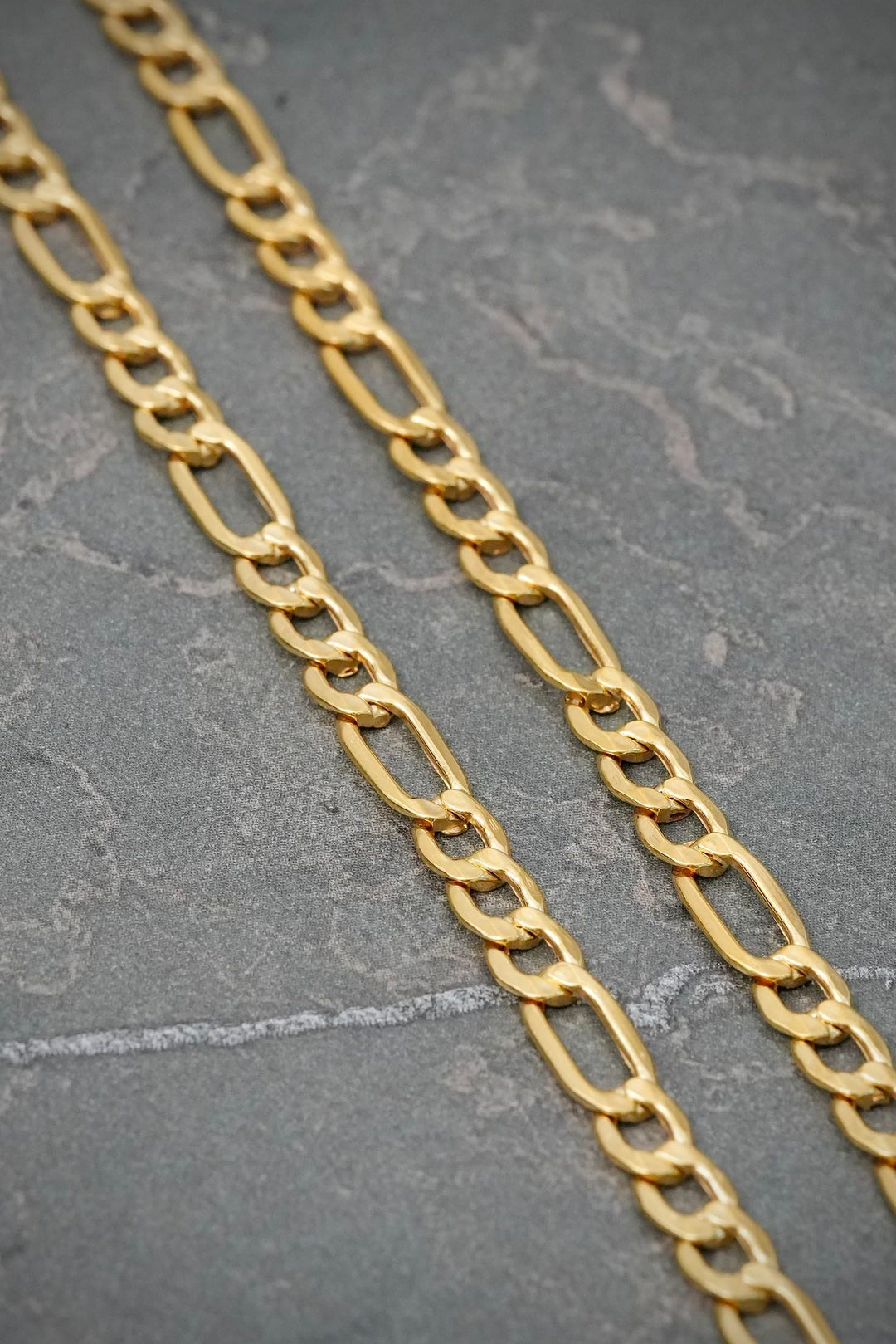 Cadena Figaro 6.65gr / 60cm / 4.5mm — Oro Amarillo
