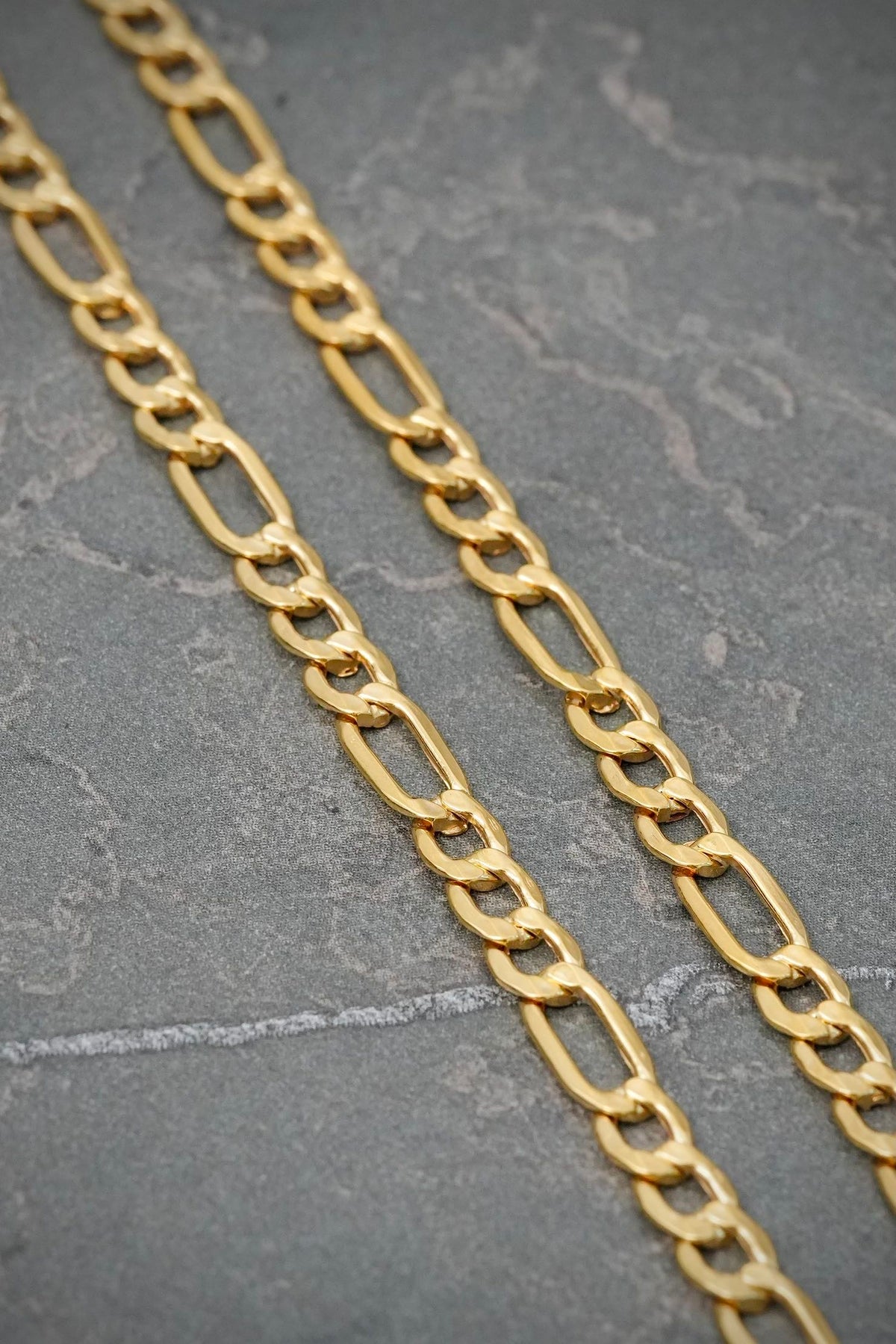 Cadena Figaro 6.65gr / 60cm / 4.5mm — Oro Amarillo
