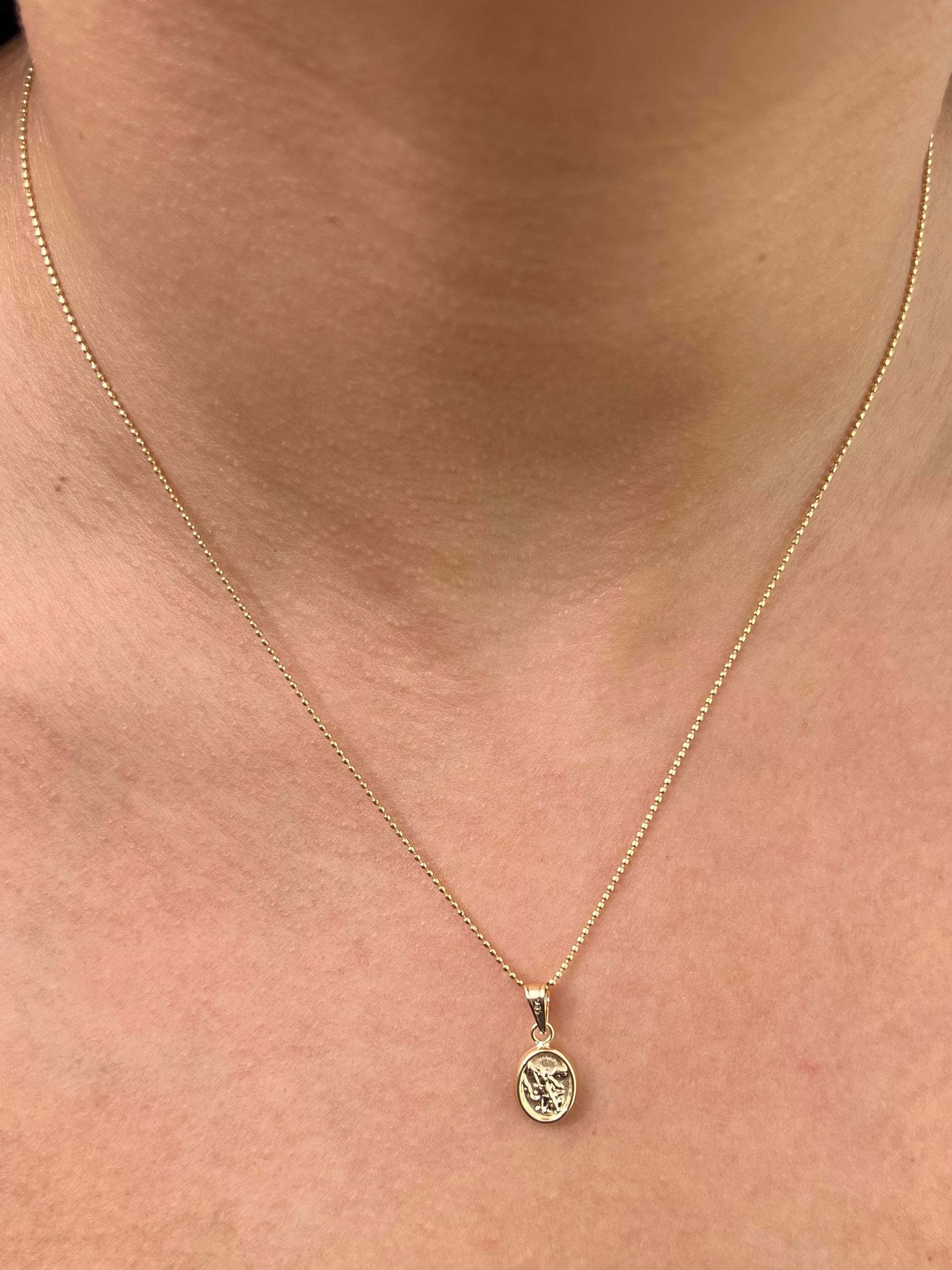 Dije arcangel san miguel 0.45gr / Largo 1.5cm / Oro Amarillo Nac P