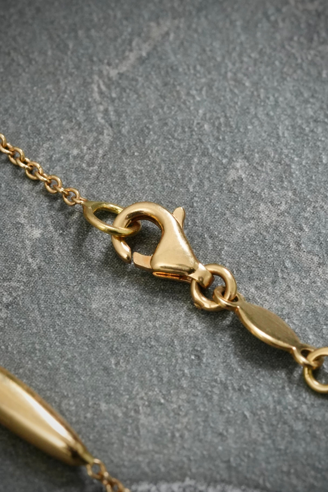 Pulso tejido rolon con swarovski blanco 2.6gr — Oro Amarillo