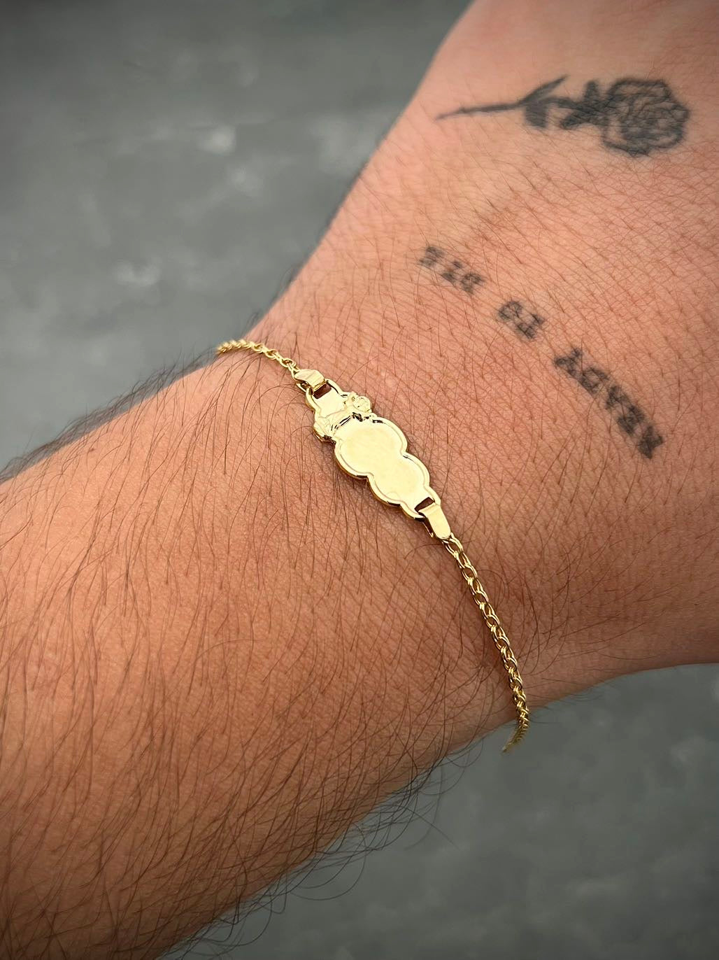 Pulso bebe con placa divino niño 1.25gr / Largo 15cm / Oro Amarillo Nac B