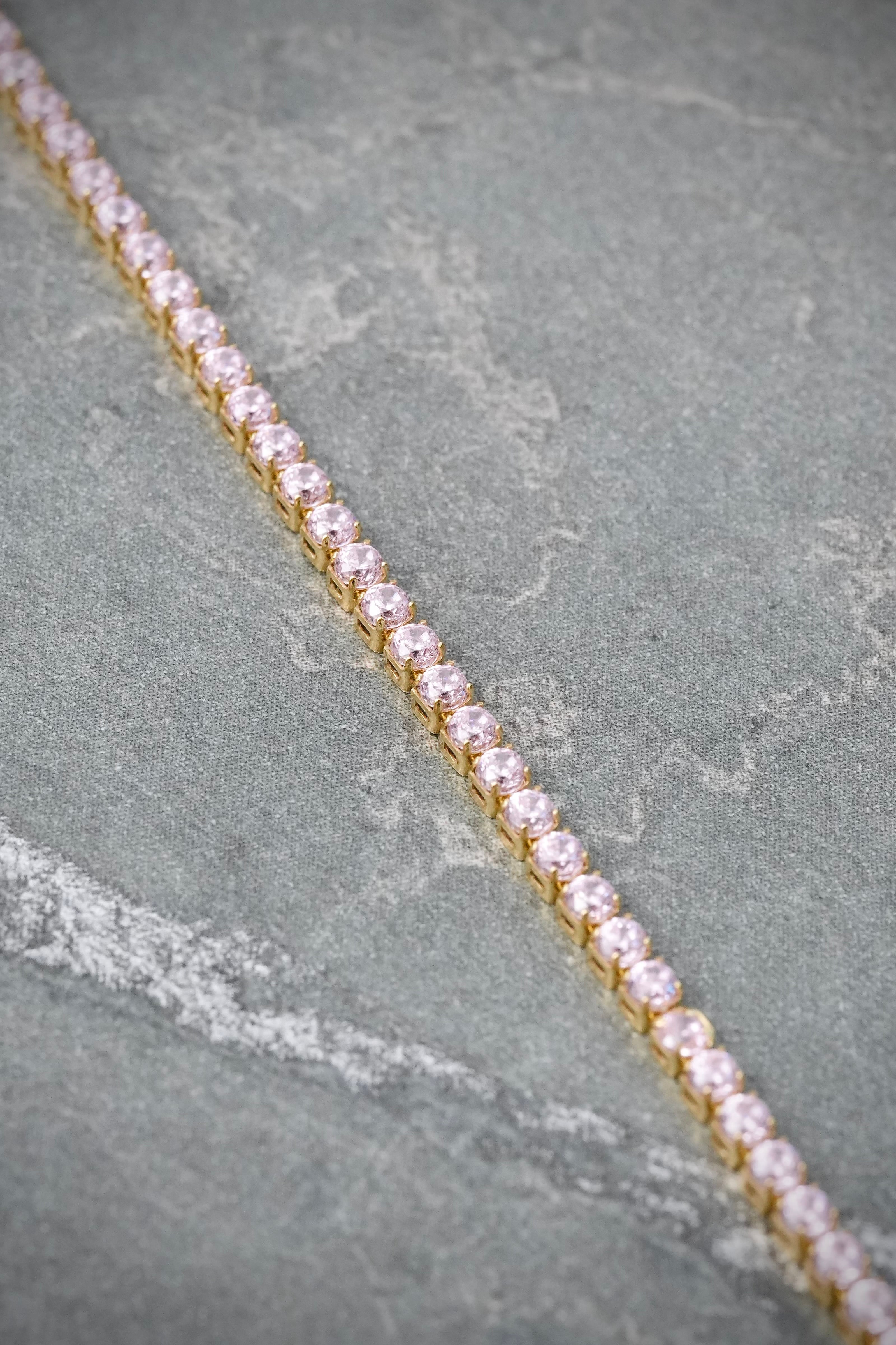 Pulso Tenis con Swarovski Rosado 2.65gr / 18cm / 1.9mm — Oro Amarillo