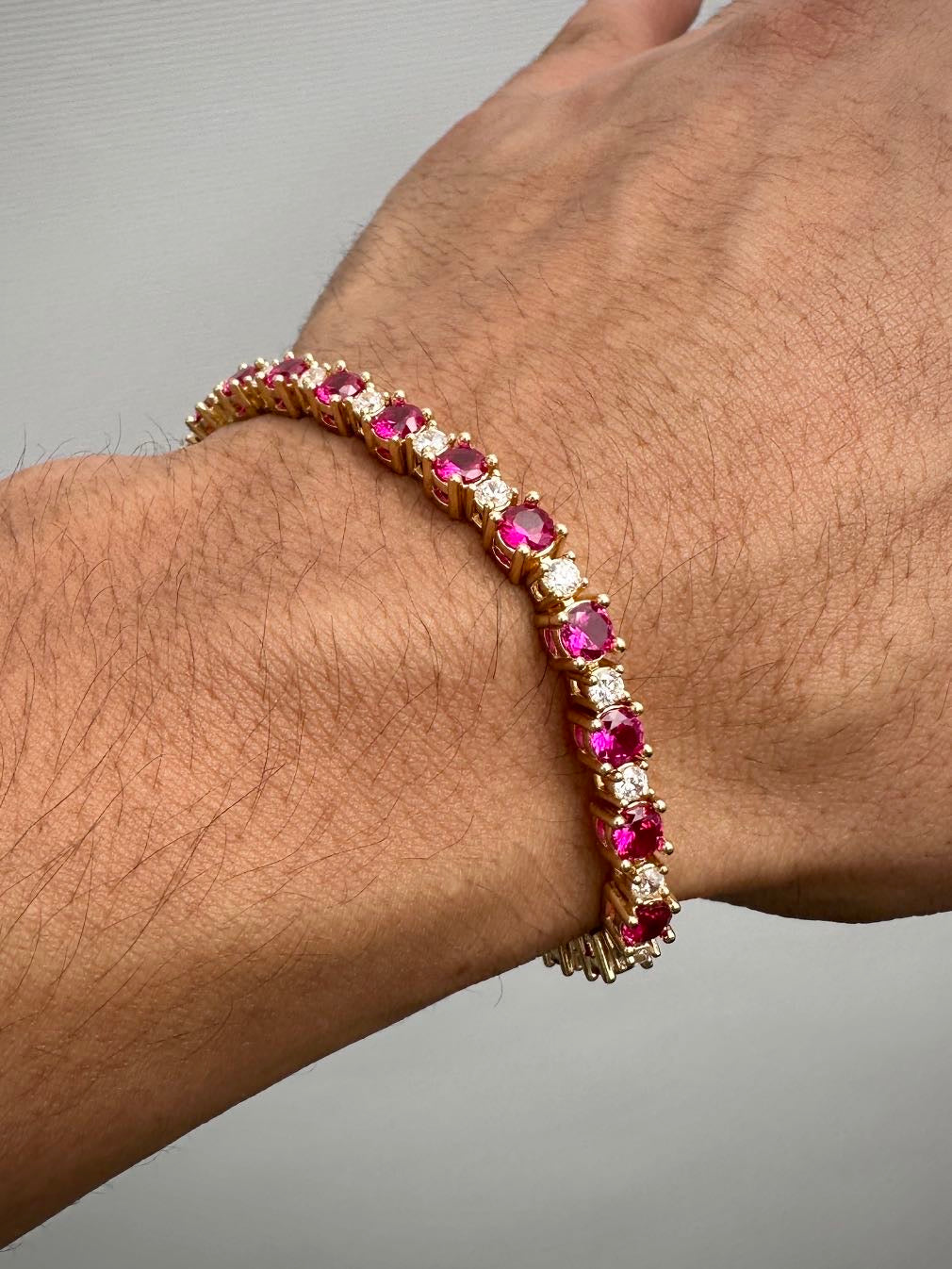 Pulso tenis con swarovski fucsia y blanco 19.35gr / Largo 17.5cm / Oro Amarillo Nac M