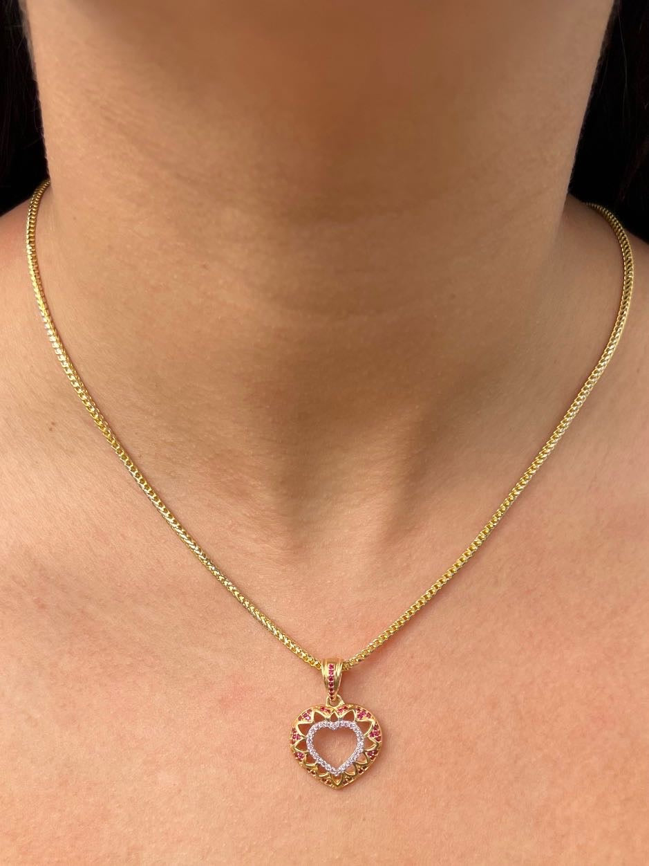 Dije corazon con swarovski fucsia y rosado 3.7gr / Largo 2.6cm / Oro Amarillo Nac B