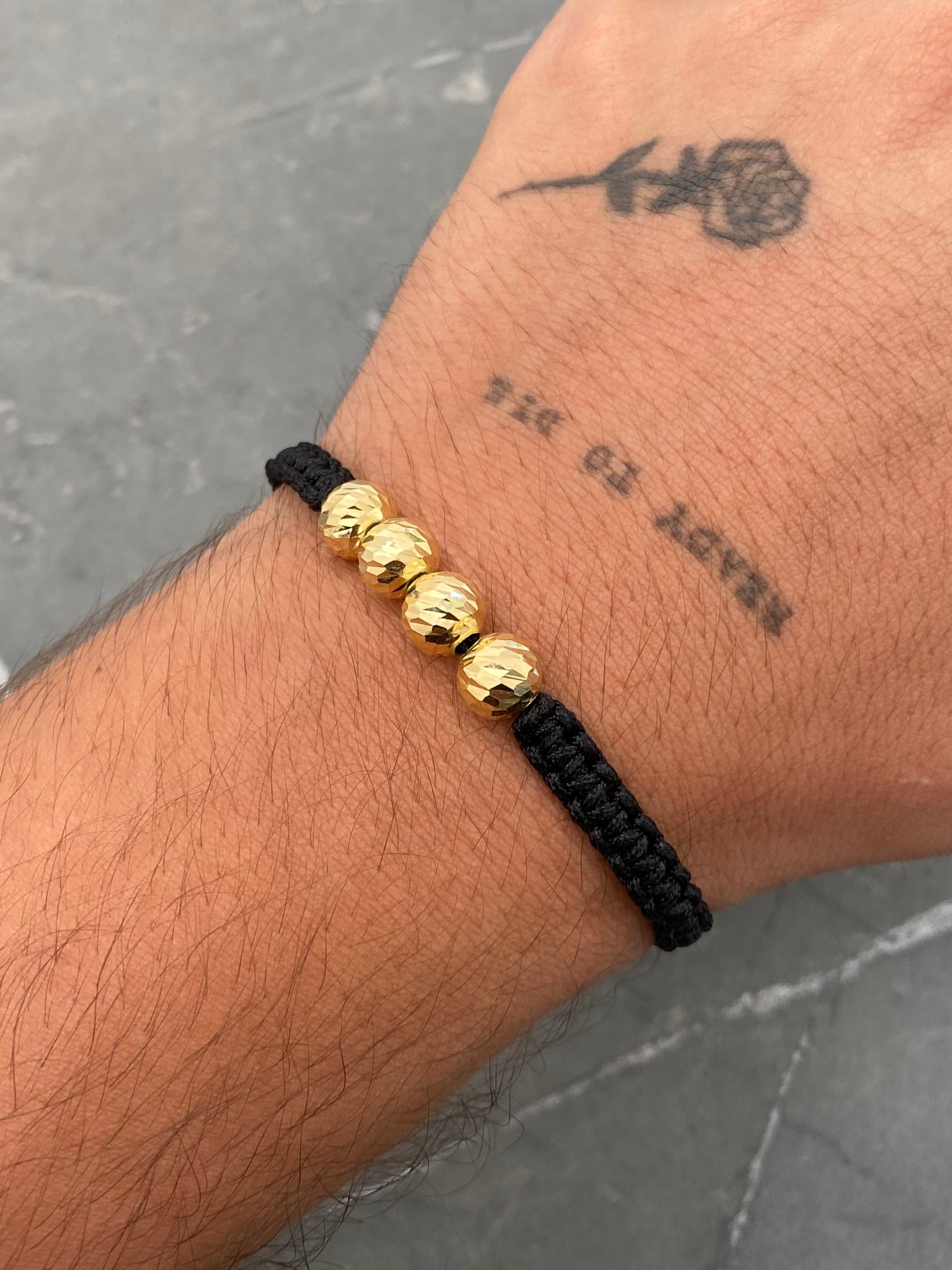 Pulsera Hilo Negro con Bolas Diamantadas 1.2gr — Oro Amarillo 18K