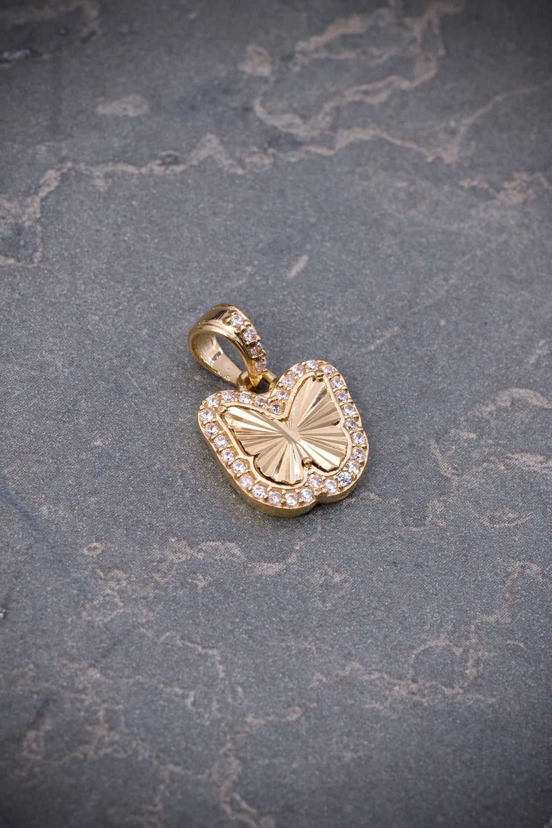 Dije mariposa con swarovski blanco 1.6gr / Largo 1.7cm — Oro Amarillo