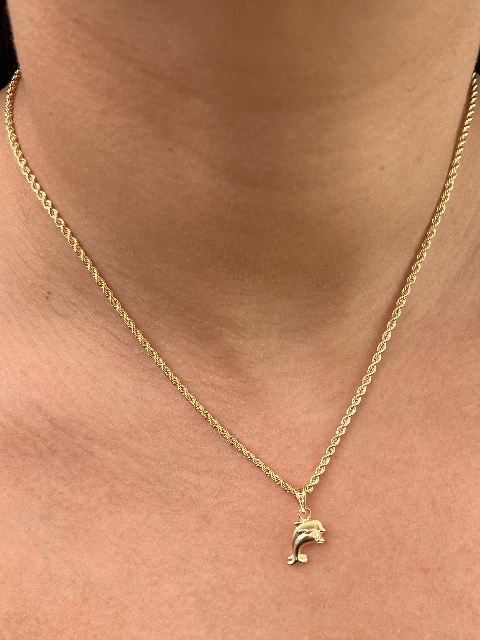 Dije de delfin 0.55gr / Largo 2.1cm / Oro Amarillo Nac B